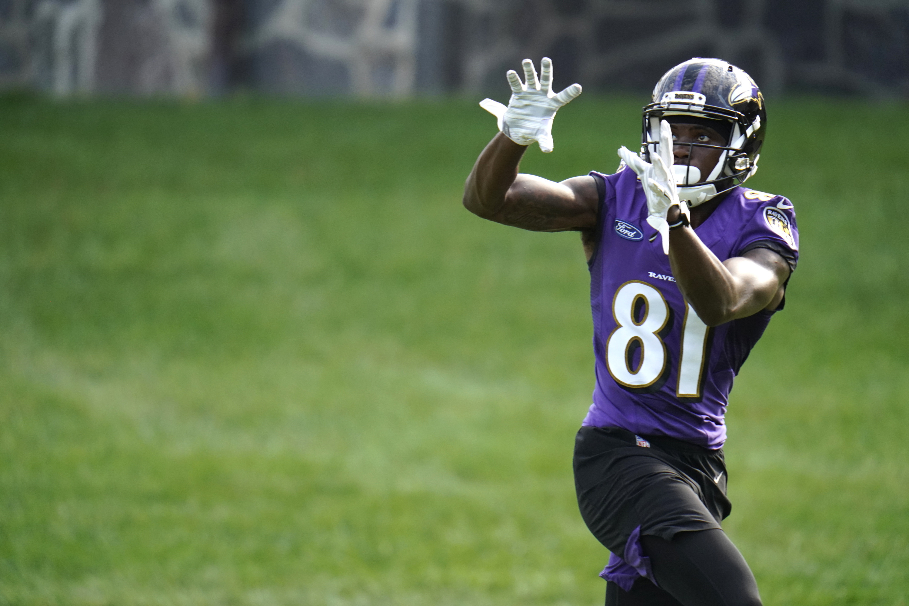 Baltimore Ravens wide receiver Jaylon Moore warms up prior to an