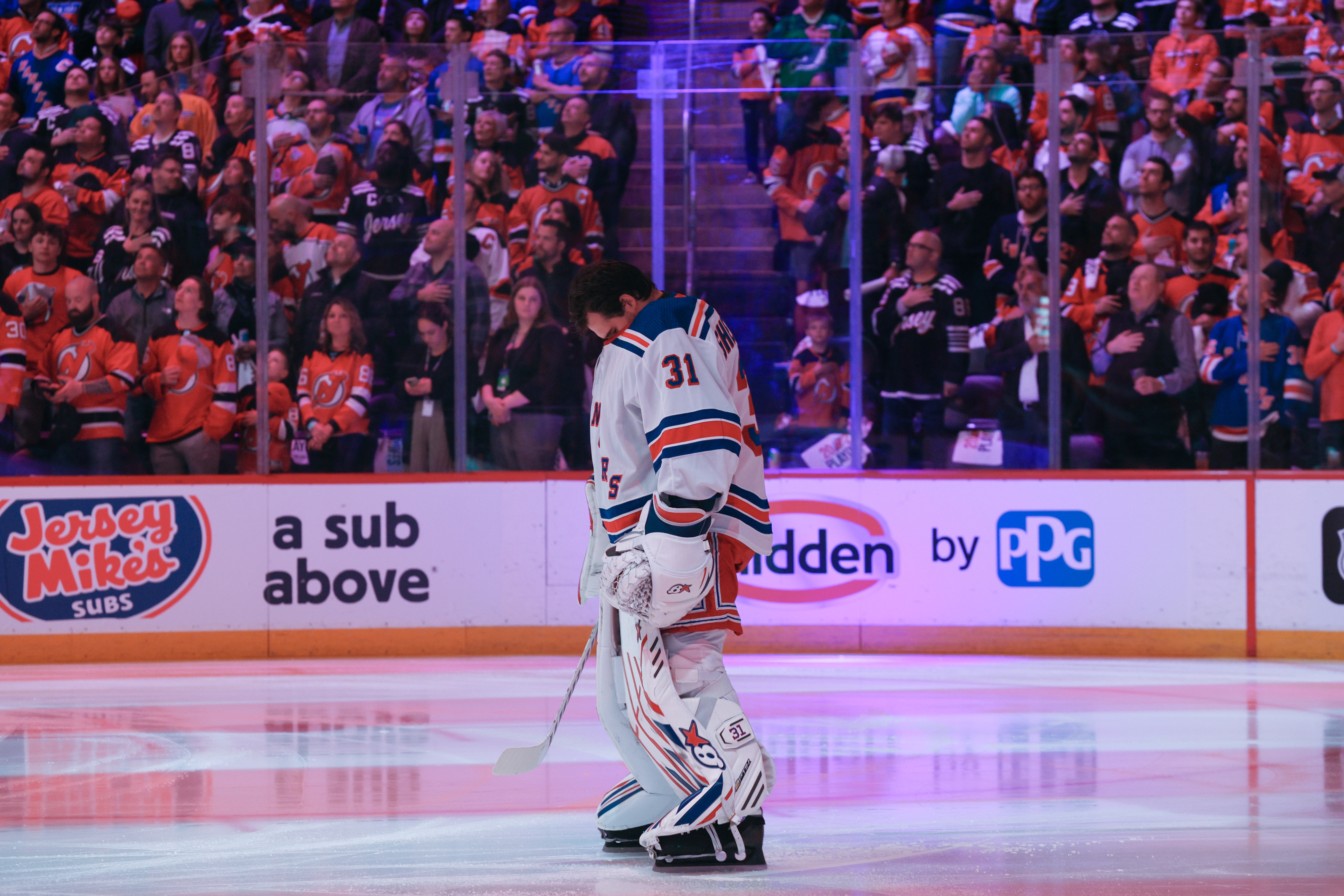 New York Rangers goaltender Igor Shesterkin (31) during the national anthem before the Rangers played the New Jersey Devils in Game 1 of the NHL Stanley Cup playoffs on Tuesday, April 18, 2023 in Newark, N.J. The Rangers won, 5-1.