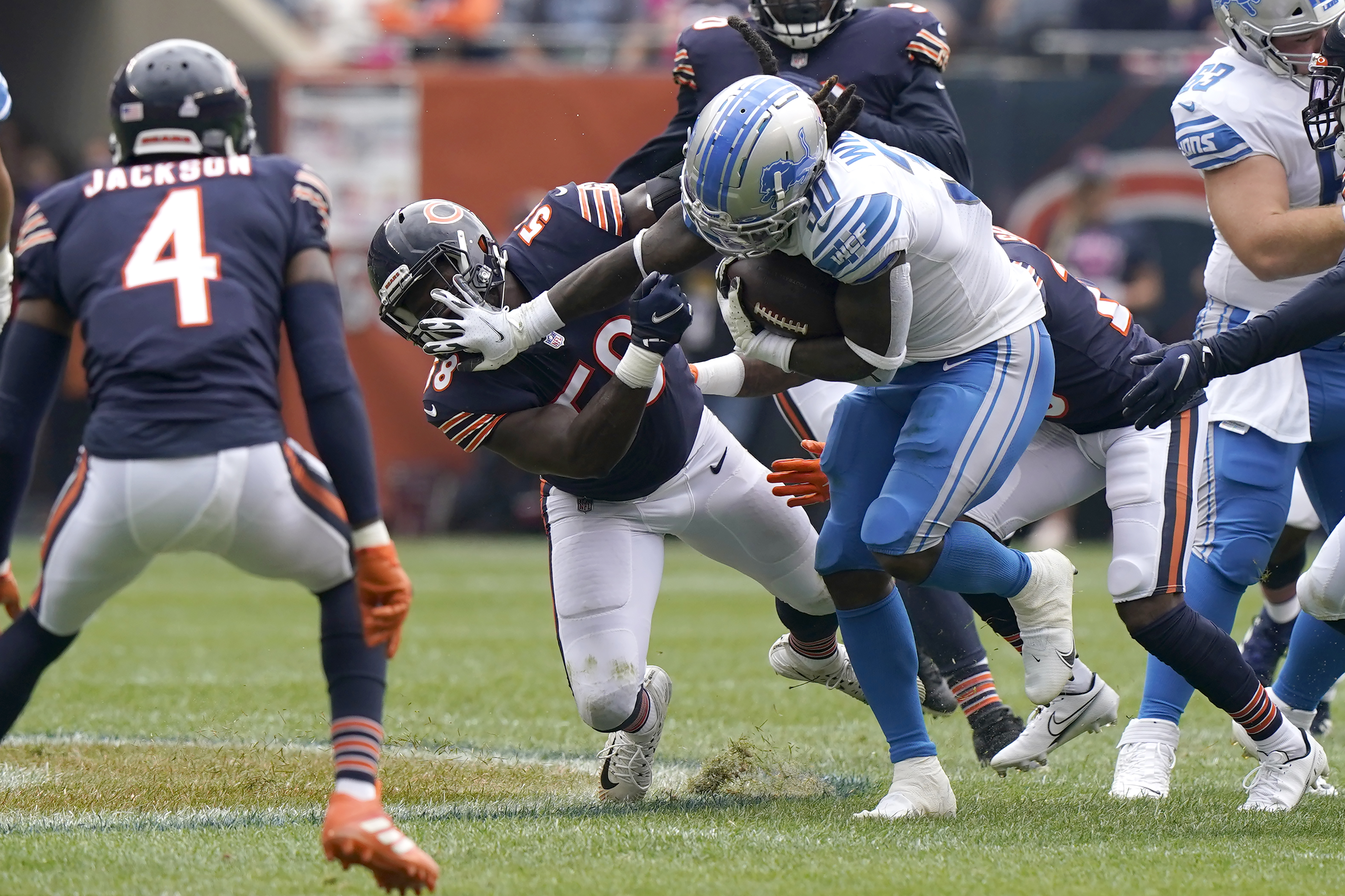 Detroit Lions running back Jamaal Williams still arms Chicago Bears inside  linebacker Roquan Smith during the first half of an NFL football game Sunday,  Oct. 3, 2021, in Chicago. (AP Photo/Nam Y.