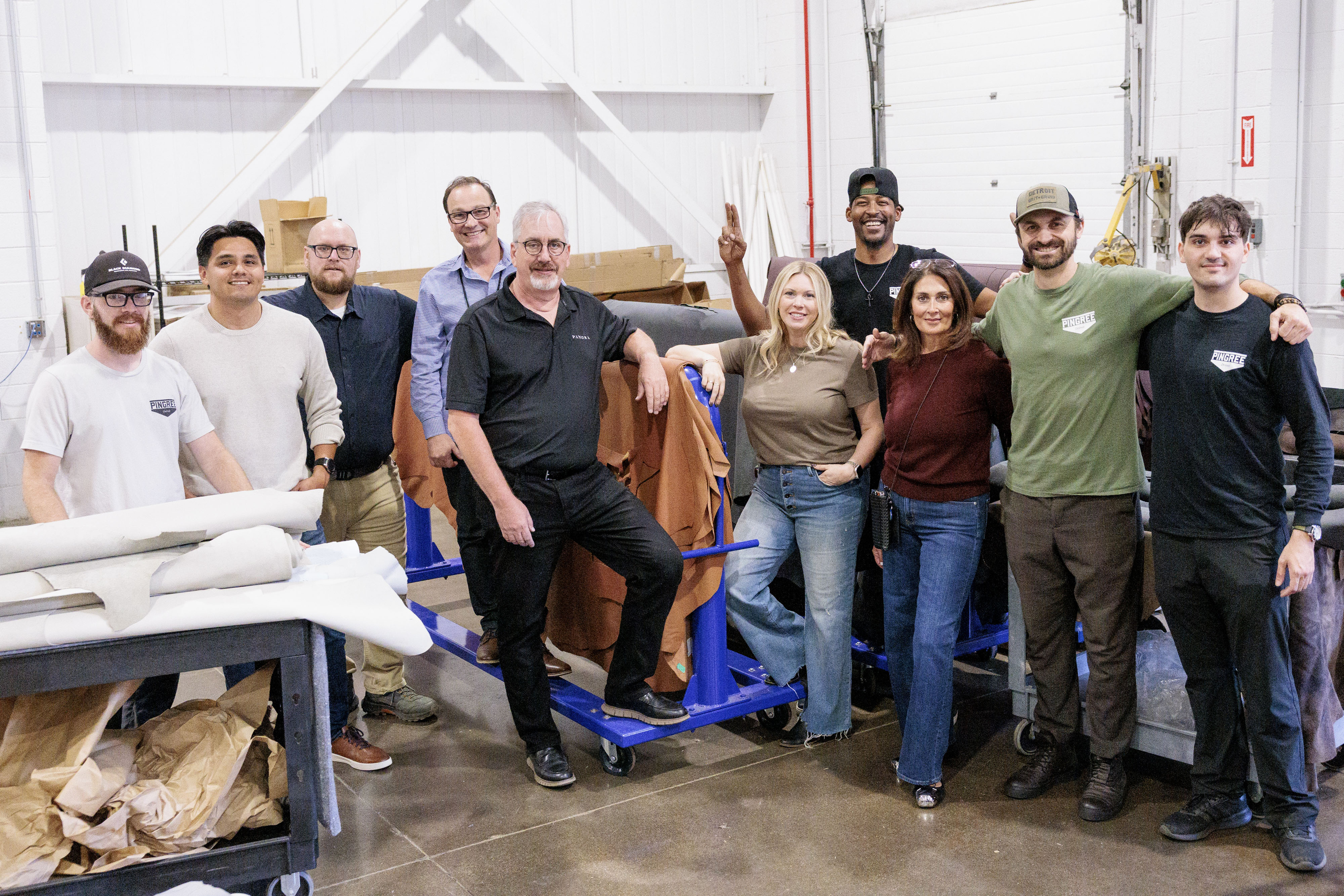 Staff from Pingree Detroit and Pangea pose at Pangea’s offices in Rochester Hills on Monday, Oct. 6 2025.
