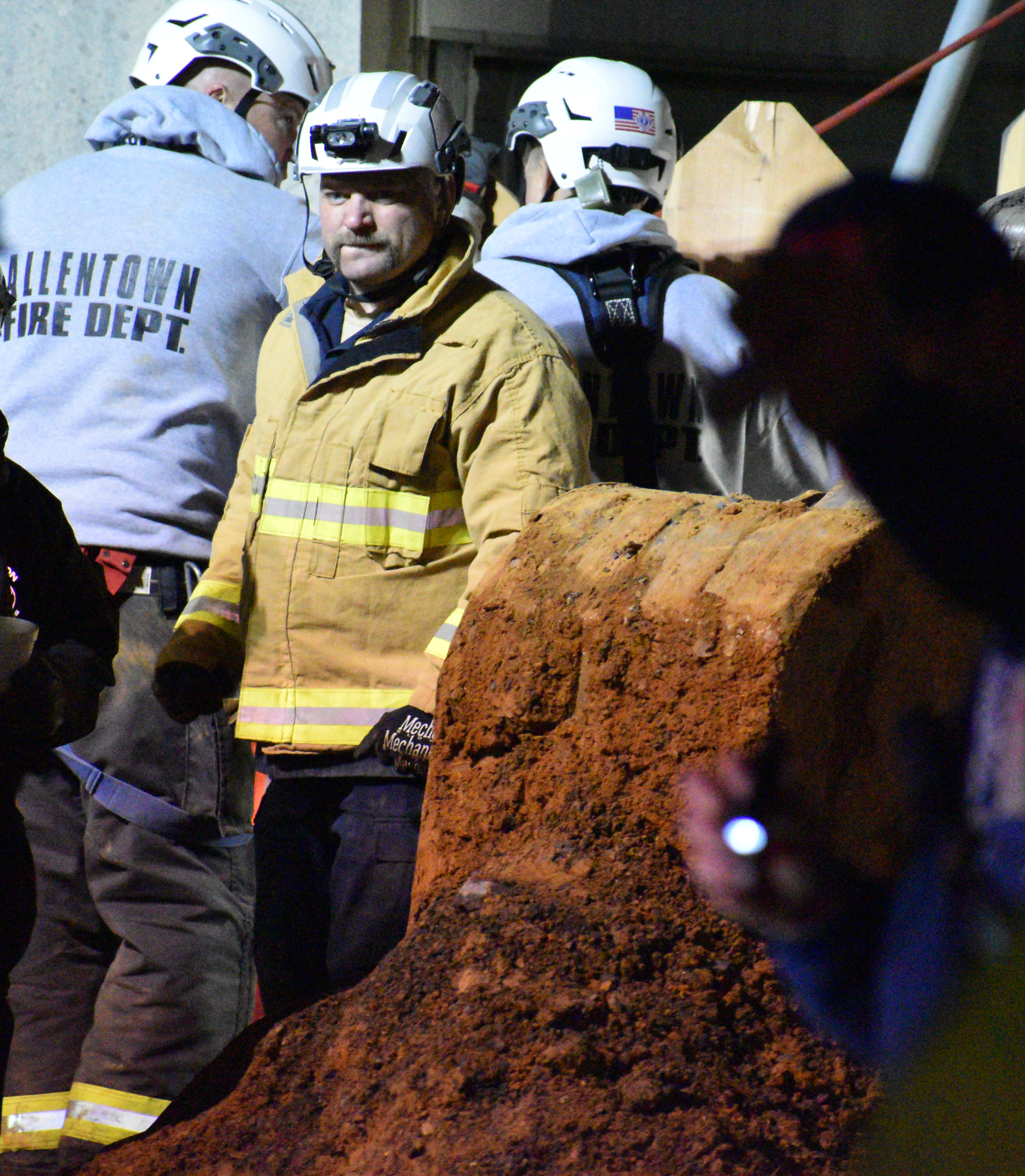 Worker rescued from trench collapse after 8 hours as temperatures ...