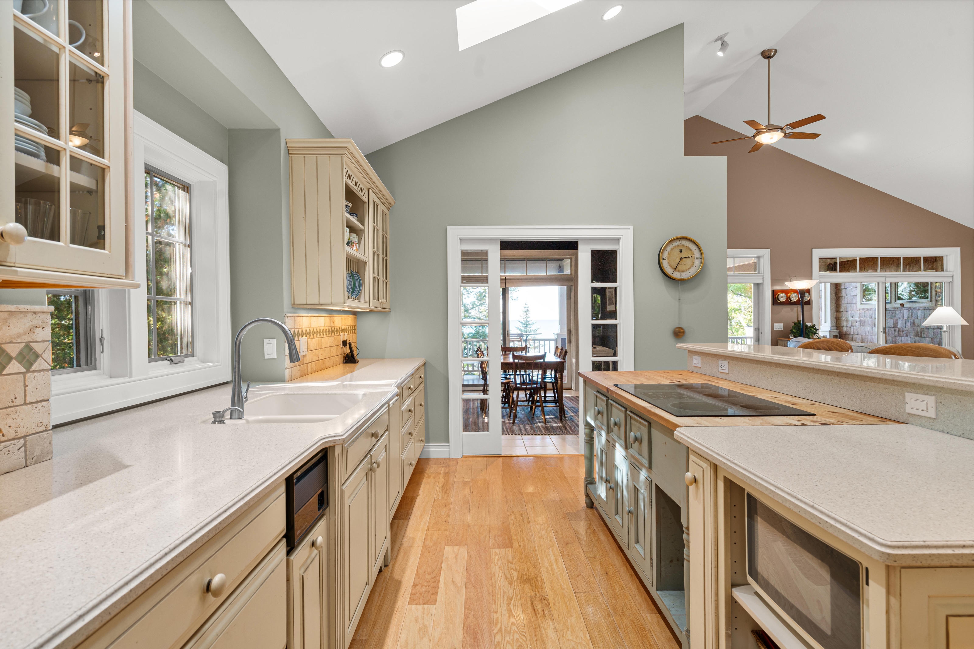 Interior photographs of 4093 Lake Shore Drive in Charlevoix, this gem is listed at $2,099,900 through Berkshire Hathaway HomeServices Michigan Real Estate – Traverse City and The Crane Group with associate broker Johnny Crane and his brother, co-listing agent Matt Crane.