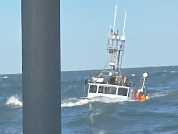 The Coast Guard rescues 4 people from a fishing boat damaged by a wave off Cape Cod