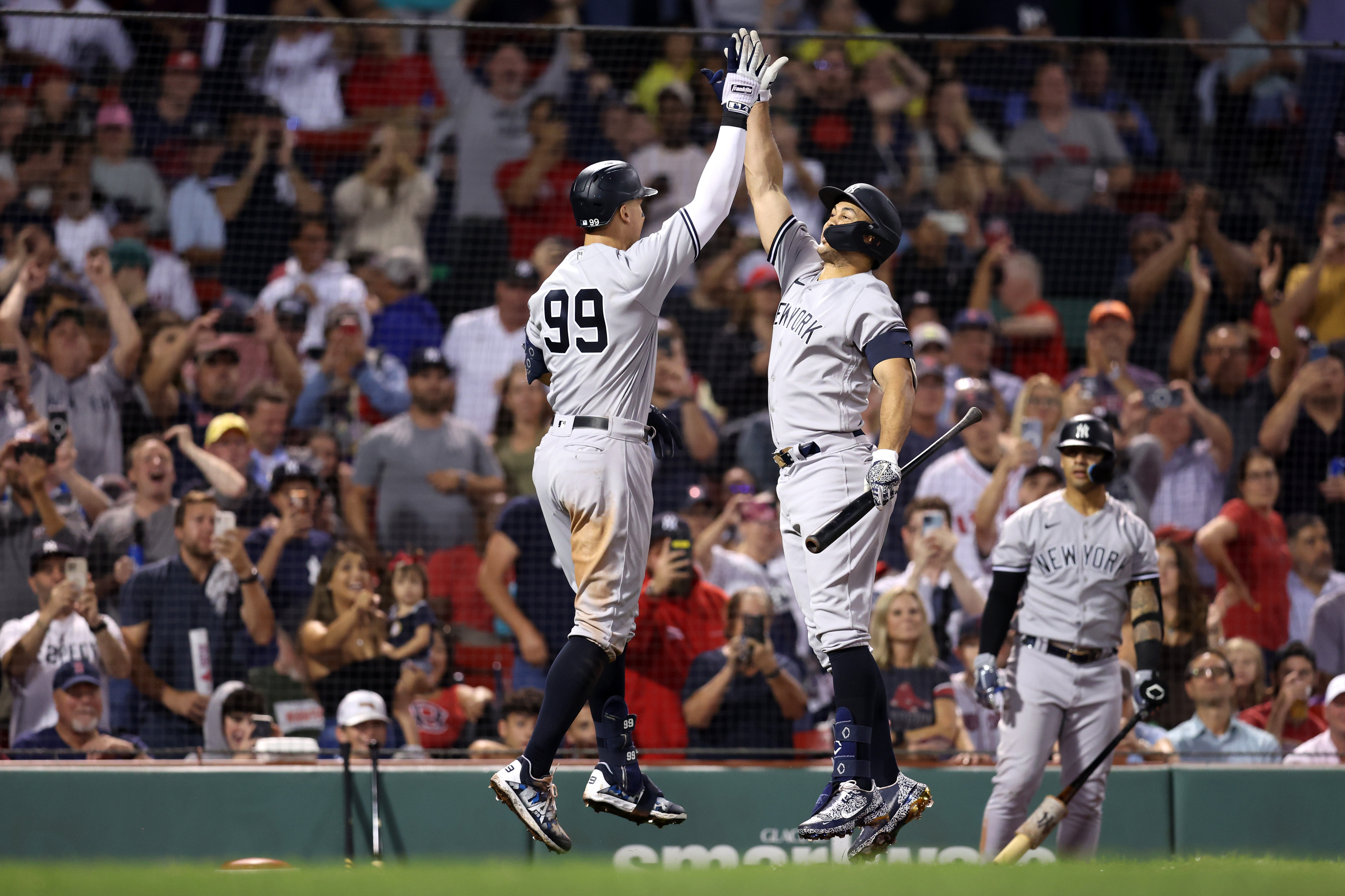 Judge homers twice to reach 57, Yanks beat Sox 7-6 in 10
