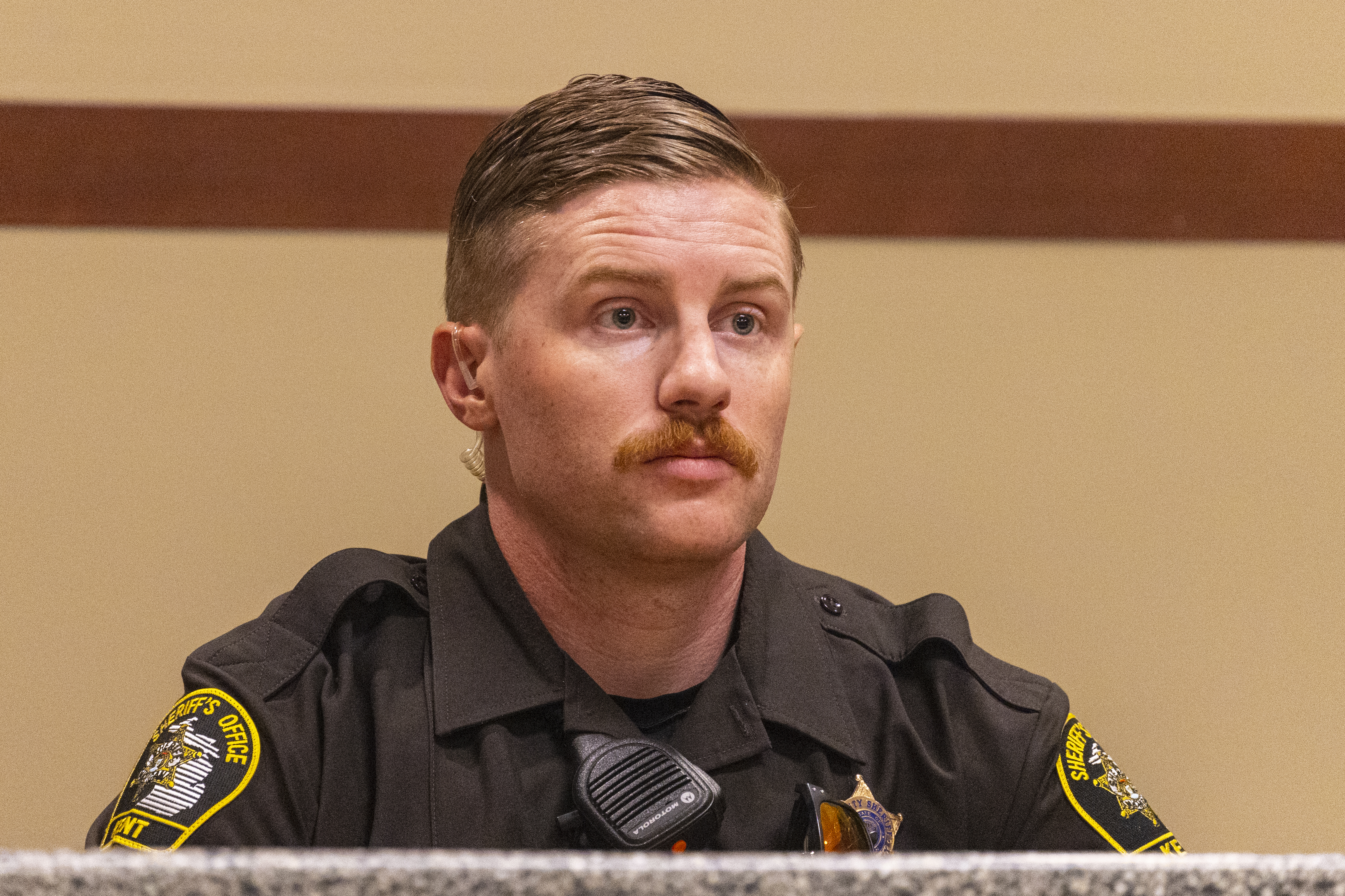 Kent County Sheriff's Deputy Andrew Bigen testifies during the preliminary examination for (not pictured) Rishy Manning, 22, Javonte Rosa, 23 and Jaheim Hayes-Goree, 20, at the 63rd District Courthouse in Grand Rapids, Michigan on Thursday, June 30, 2022. The trio of defendants who appeared in court, are charged with felony murder in the shooting death of Joseph Wilder, 50, who was shot and killed during a robbery attempt at a Huntington Bank ATM on South Division Avenue in May of 2022. (Joel Bissell | MLive.com)
