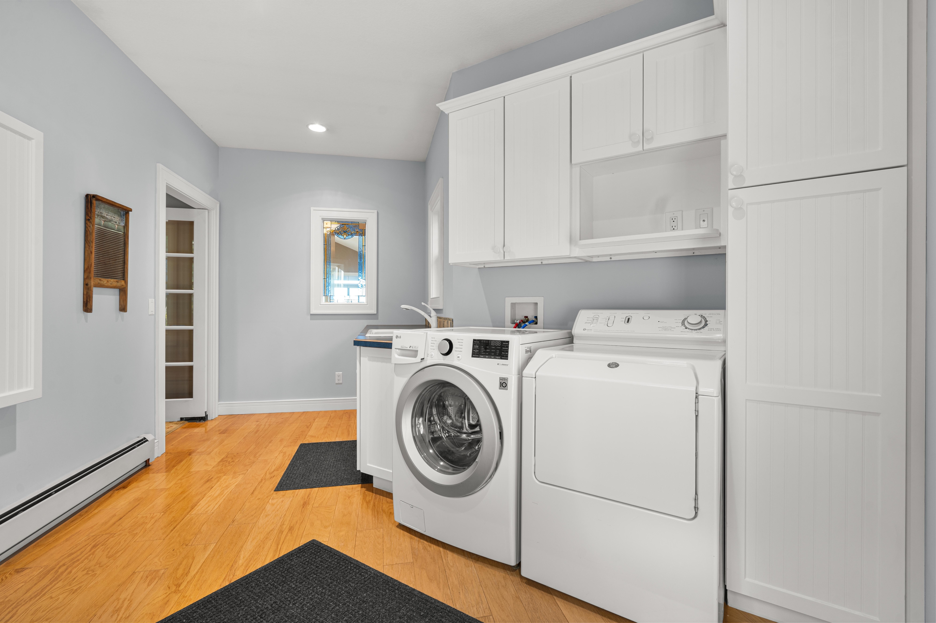 Interior photographs of 4093 Lake Shore Drive in Charlevoix, this gem is listed at $2,099,900 through Berkshire Hathaway HomeServices Michigan Real Estate – Traverse City and The Crane Group with associate broker Johnny Crane and his brother, co-listing agent Matt Crane.