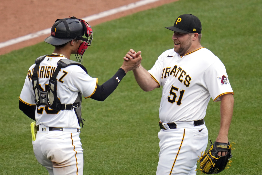 Pirates rally past Guardians 7-5 to avoid sweep