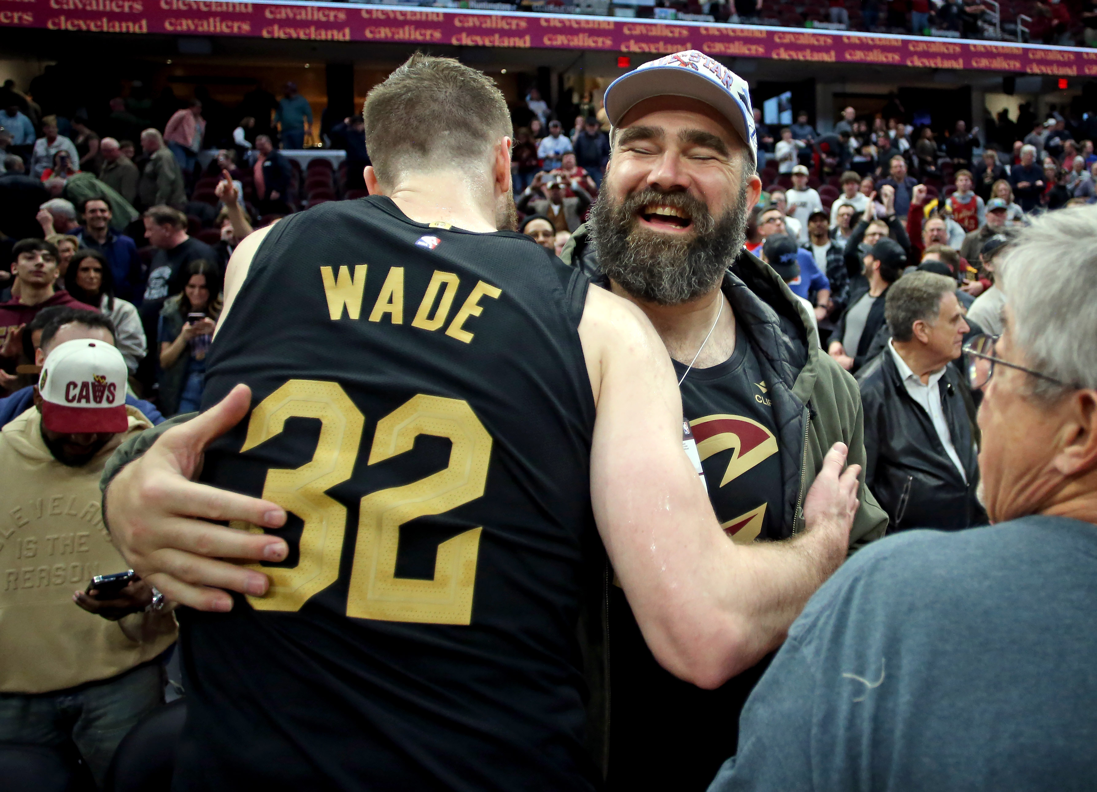 Cleveland Cavaliers forward Dean Wade greets Jason Kelce after the game against the Boston Celtics. 
