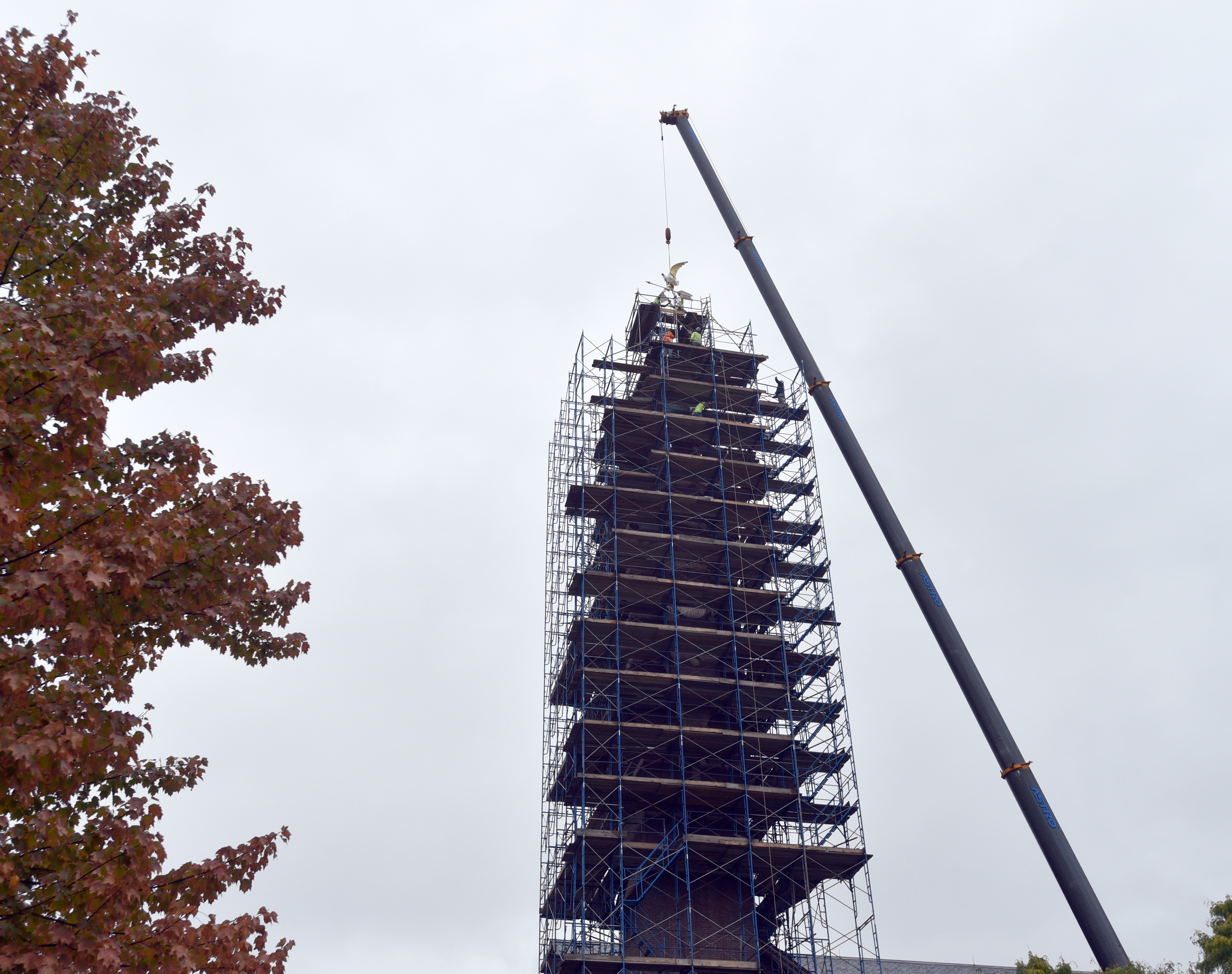 10/6/2020 -Chicopee-   A replica of  the "Chicopee Eagle Weathervane" is placed on top of the City Hall Clock Tower, now undergoing renovations. The original eagle will be on display in the City Hall auditorium once building renovations are complete.   (Don Treeger / The Republican)