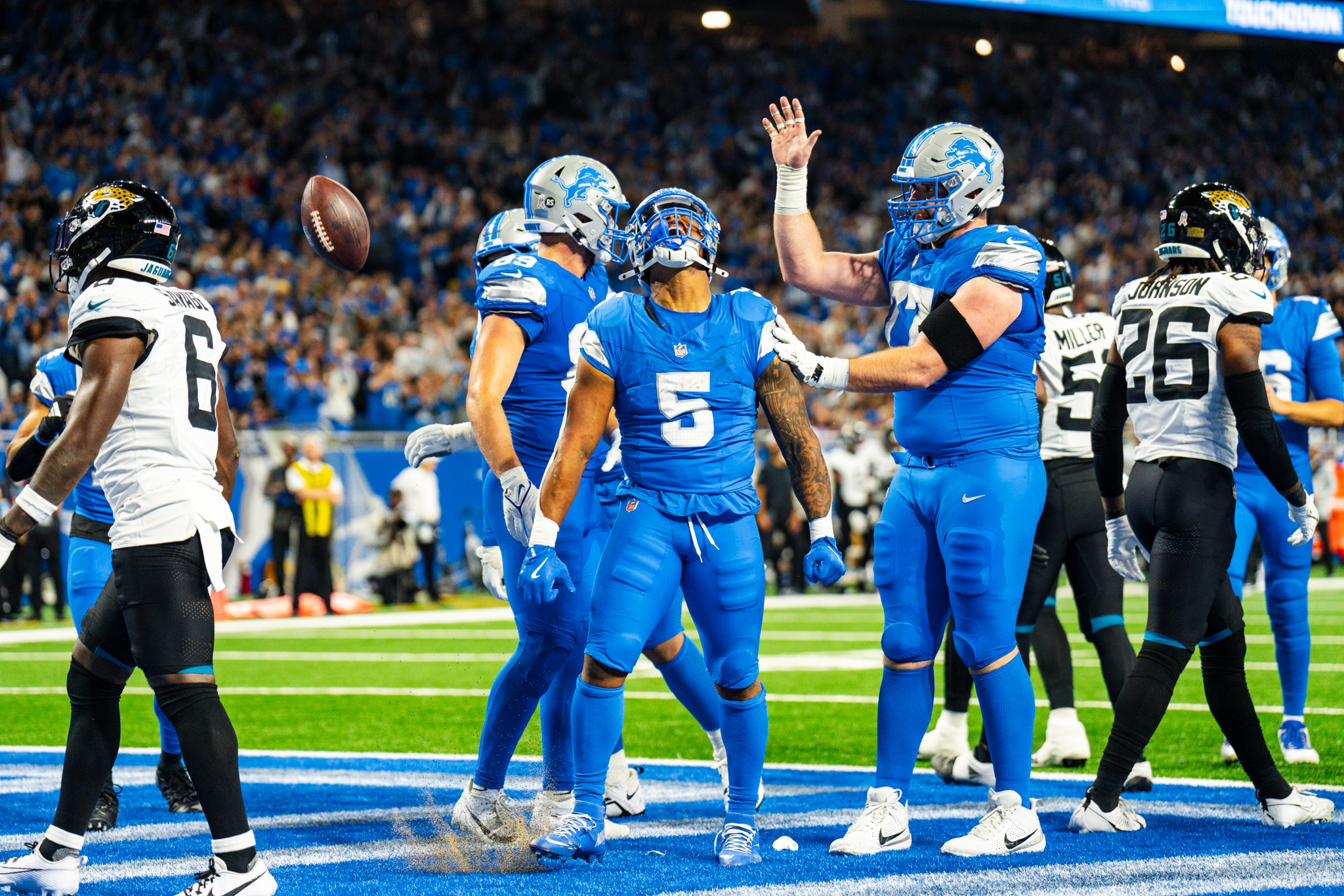 Detroit Lions running back David Montgomery (5) celebrates a touchdown during Detroit Lions vs. Jacksonville Jaguars at Ford Field in Detroit, Michigan on Sunday, Nov. 17, 2024.