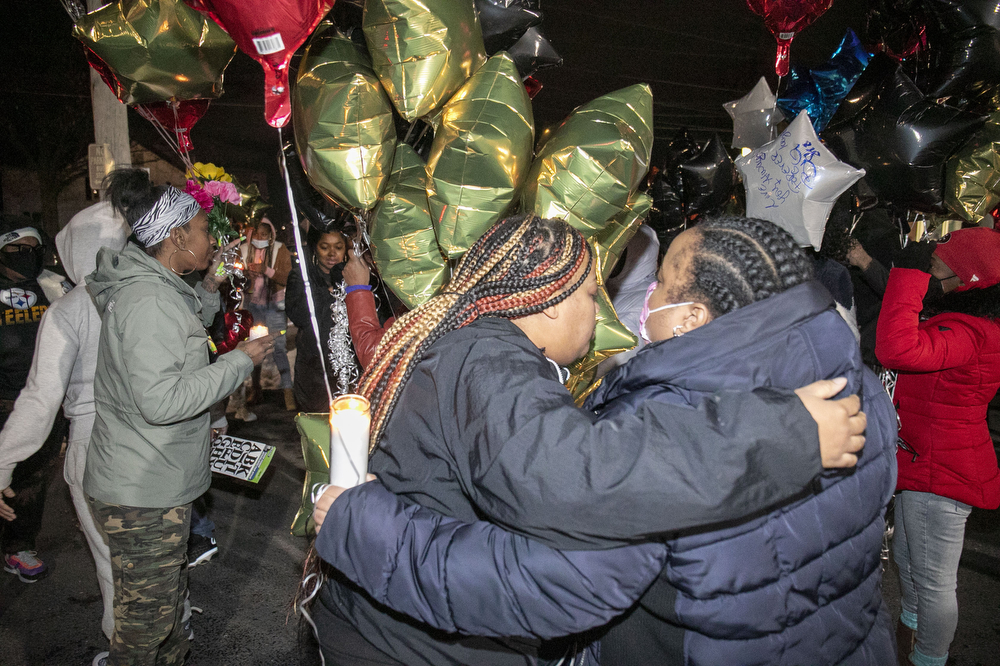 Family and friends of Xavier “Junior” King gather to release balloons outside the bar where he was shot and killed Sunday night in Harrisburg, Pa., Jan. 18, 2022.Mark Pynes | mpynes@pennlive.com