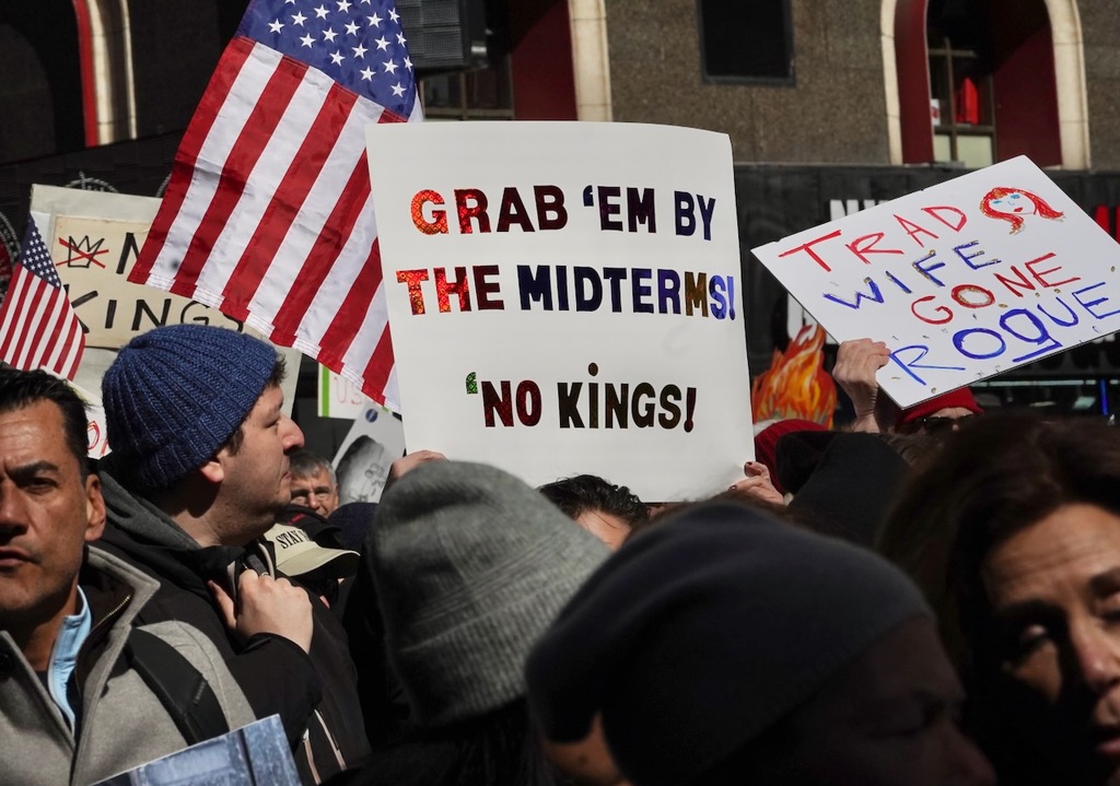 Photos: Tens of thousands march through Times Square in ‘No Kings ...