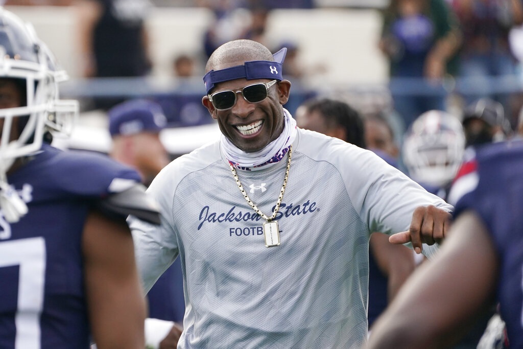 Sports world reacts to Deion Sanders flipping No. 1 recruit Travis Hunter  from Florida State to Jackson State: 'Coach Prime's biggest score' -  