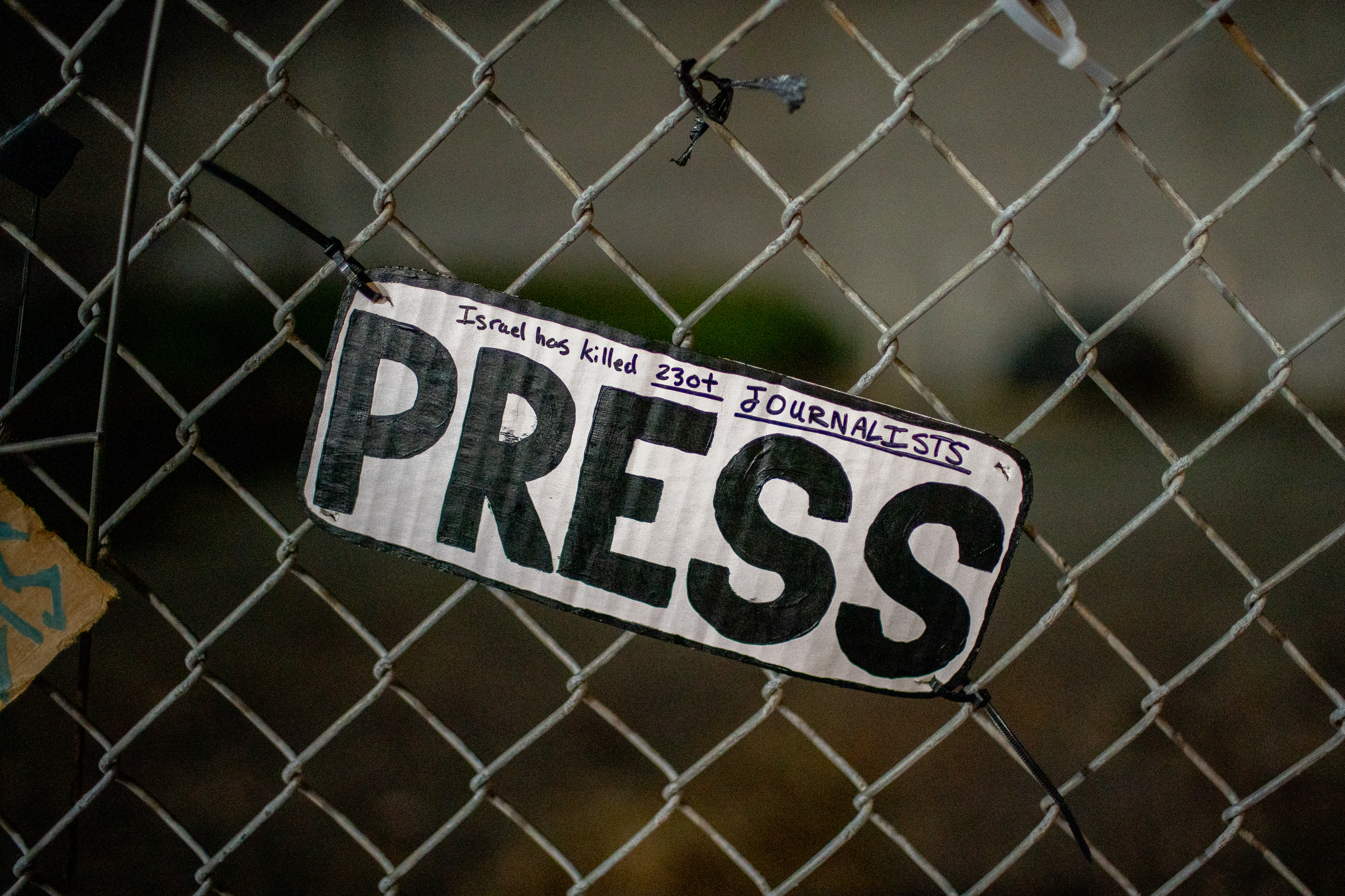Protesters gather outside the boarded-up U.S. Immigration and Customs Enforcement building in South Portland on Monday, Sept. 8, 2025, days after President Donald Trump suggested federal intervention.