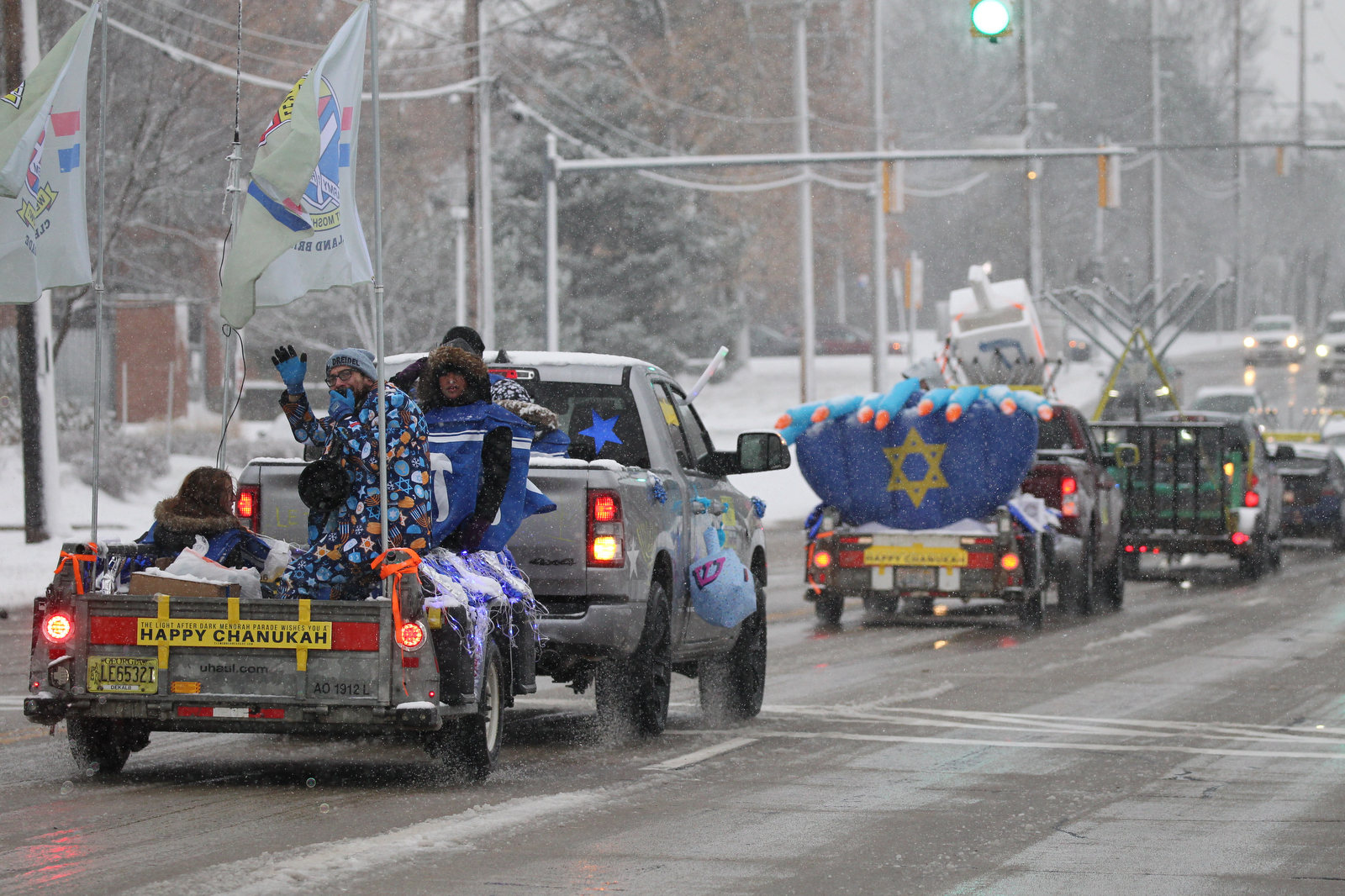 Menorah-topped cars parade through Cleveland eastern suburbs