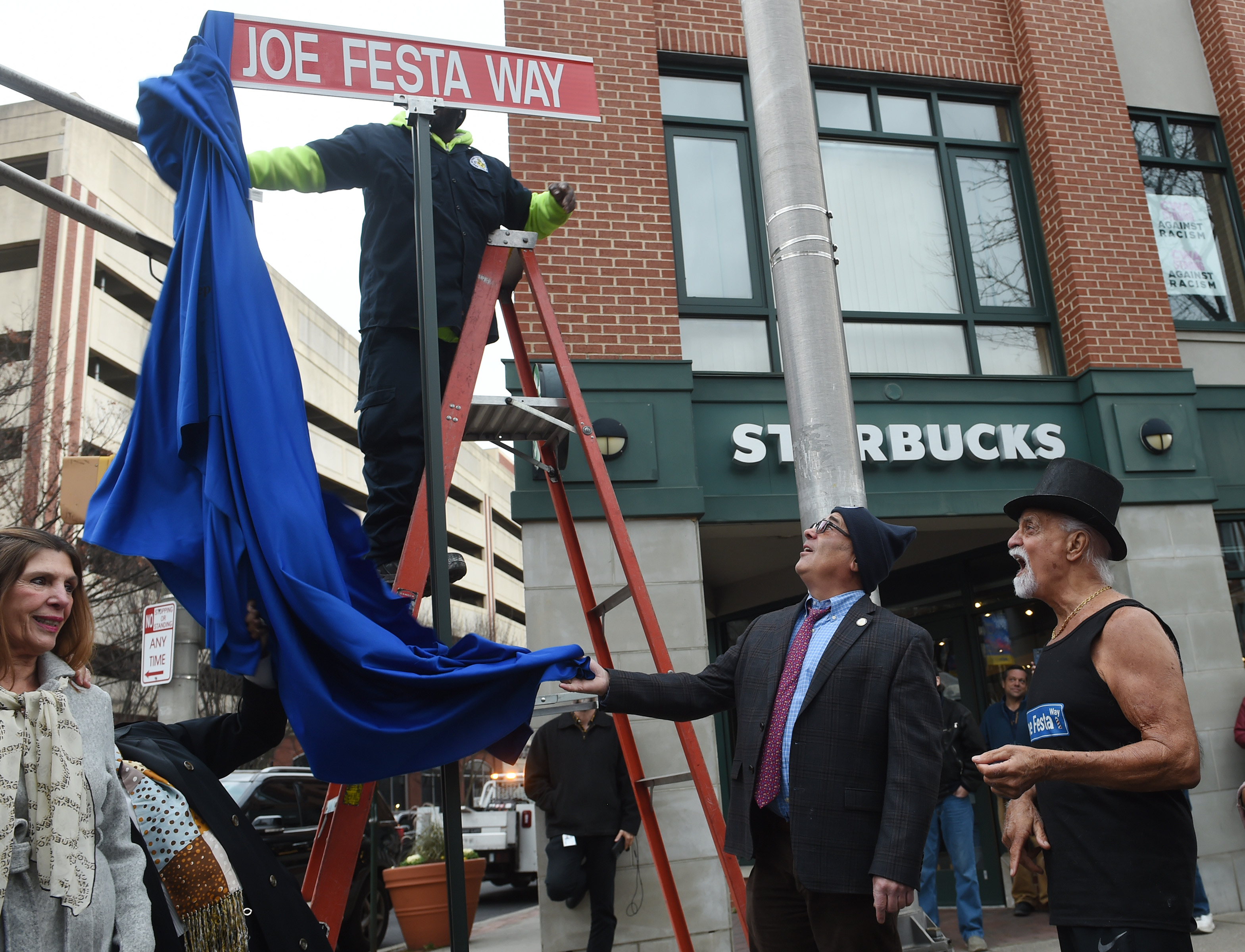 Trenton barber shop owner for 60 years gets street named in his honor