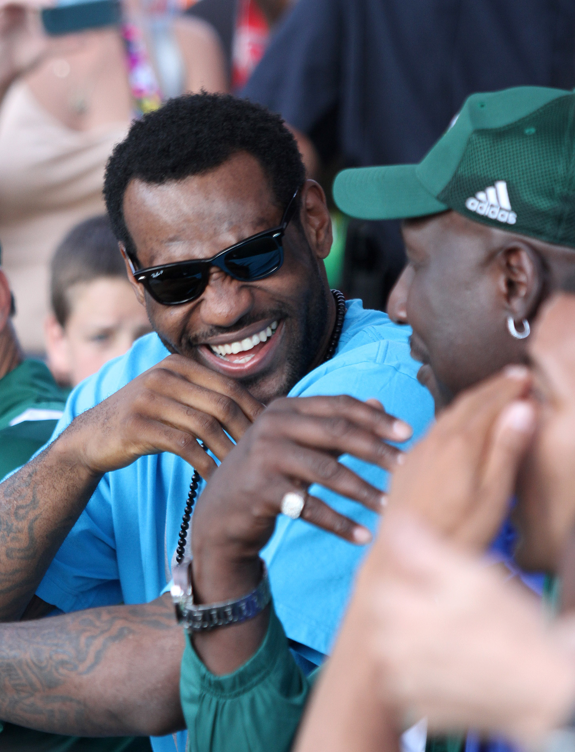 LeBron James shares a laugh with former NBA player Darryl Dawkins at the Cleveland Sprite Slam Dunk Showdown at Time Warner Cable Amphitheater Saturday, May 29, 2010 at Tower City in Cleveland. (Joshua Gunter/ The Plain Dealer)