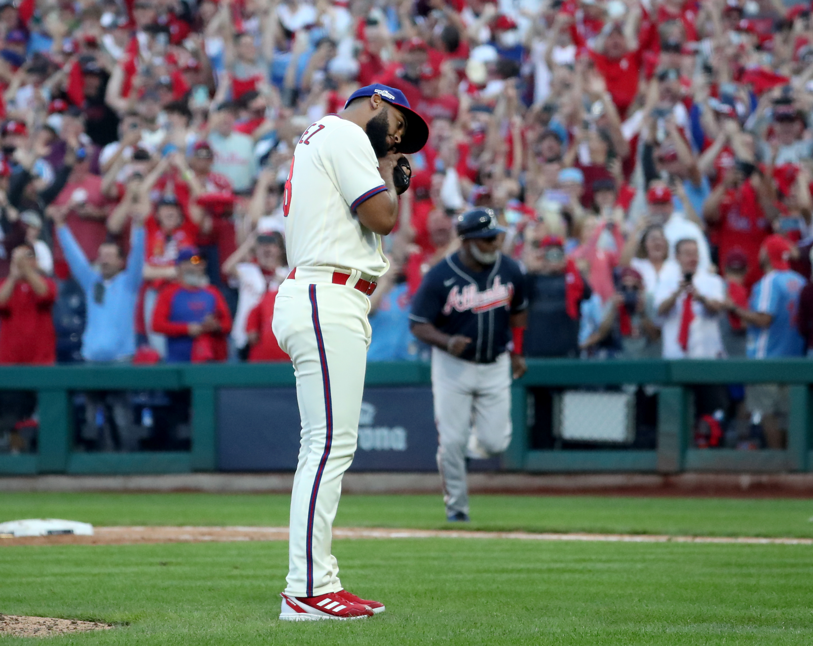 Phillies advance to NLCS, knock out defending champs behind Marsh