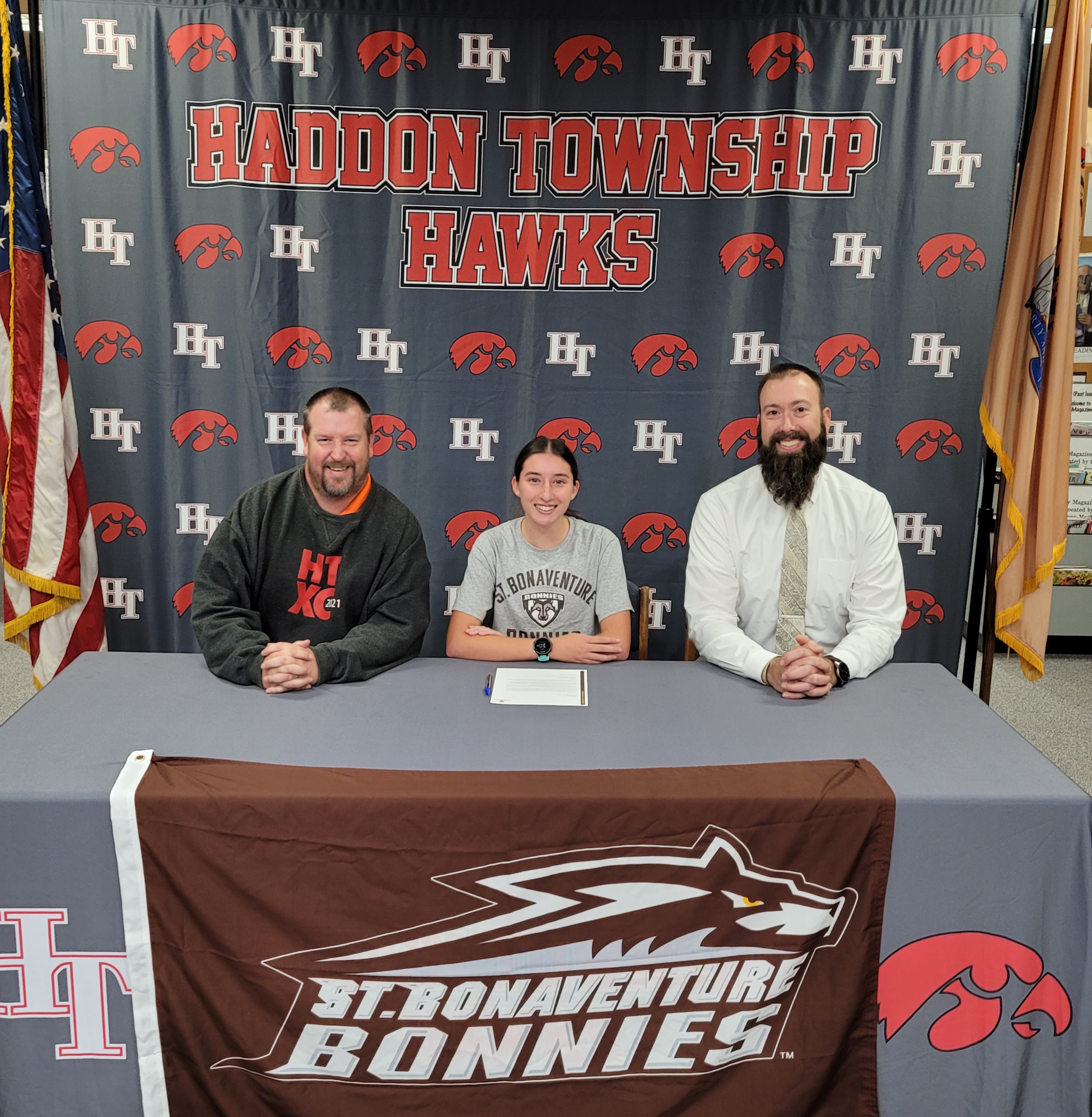 Coach Jim Younglove, Meghan Lex, Assistant Principal Kevin Greway.
Meghan Lex has signed a NLI to run cross country at St Bonaventure.