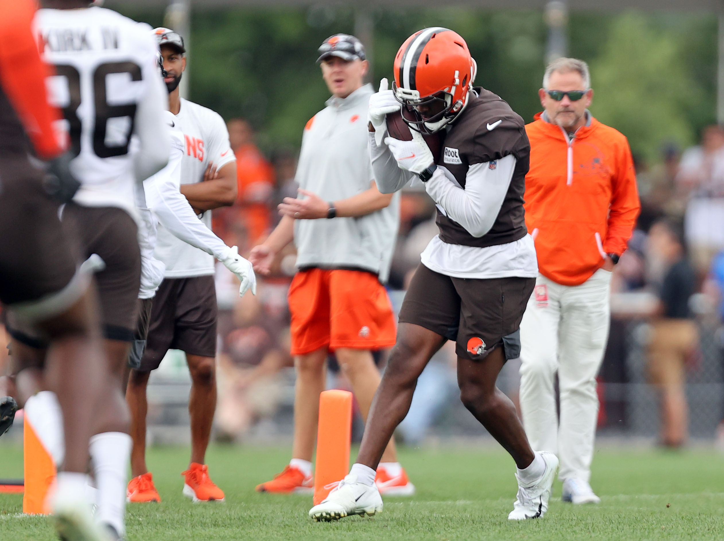 Cleveland Browns offensive tackle James Hudson III (66) walks back to the  line of scrimmage during