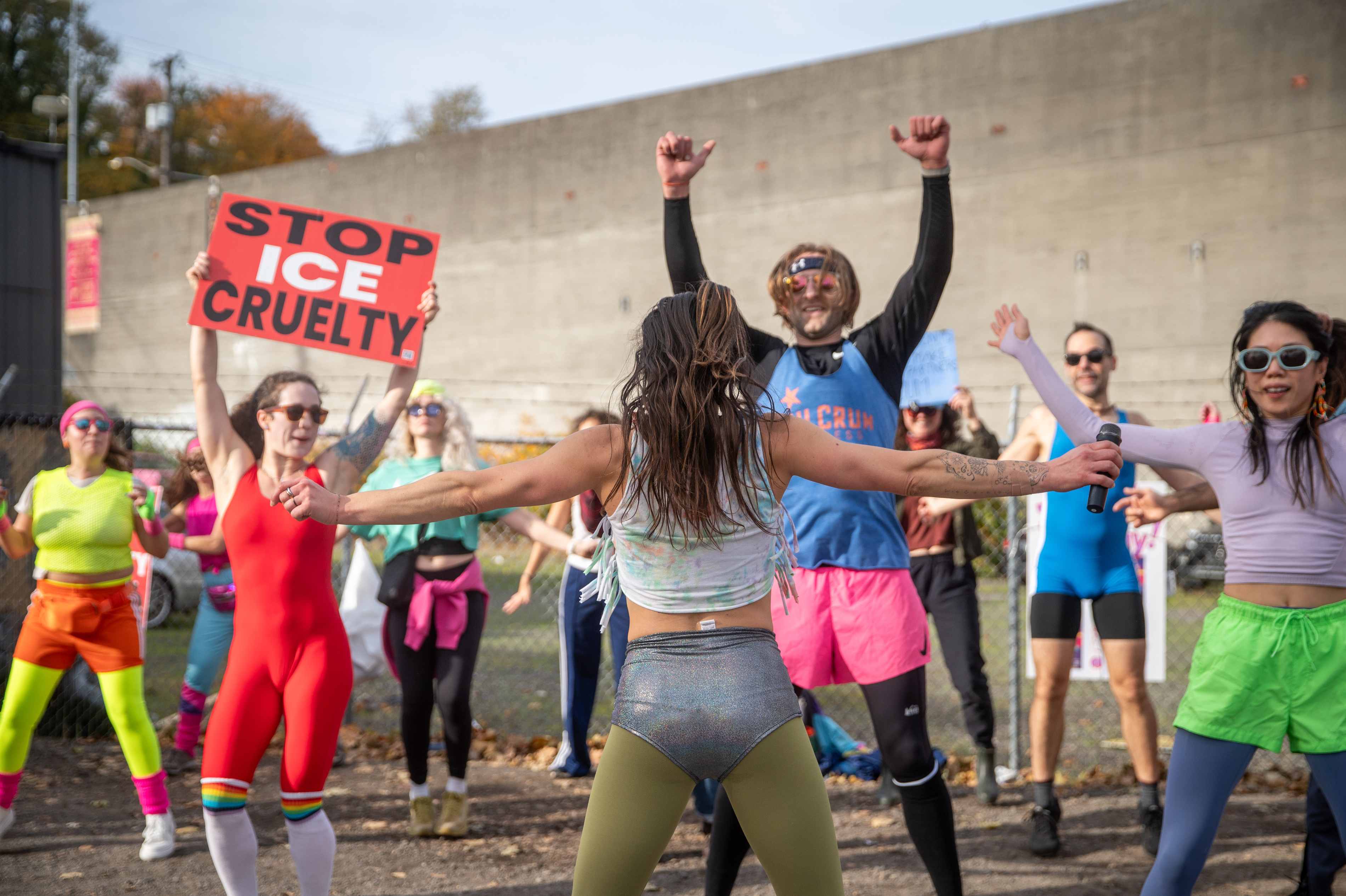 Participants in Fulcrum Fitness’s “Sweatin’ Out the Fascists” held an ’80s-aerobics peaceful protest outside the U.S. Immigration and Customs Enforcement (ICE) facility in South Portland on Sunday, Nov. 9, 2025, collecting donations for the Oregon Food Bank.