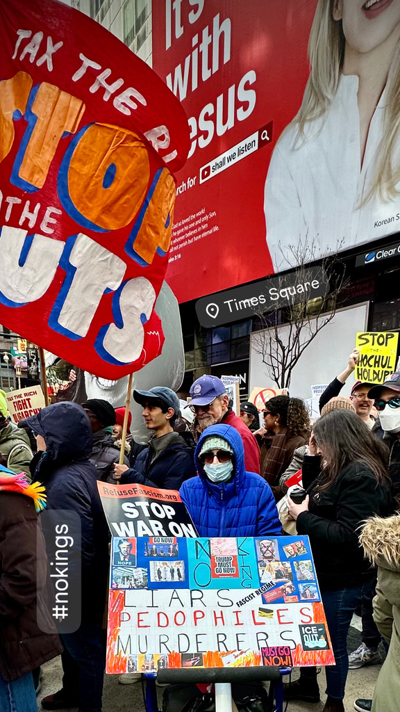 Photos: Tens of thousands march through Times Square in ‘No Kings ...