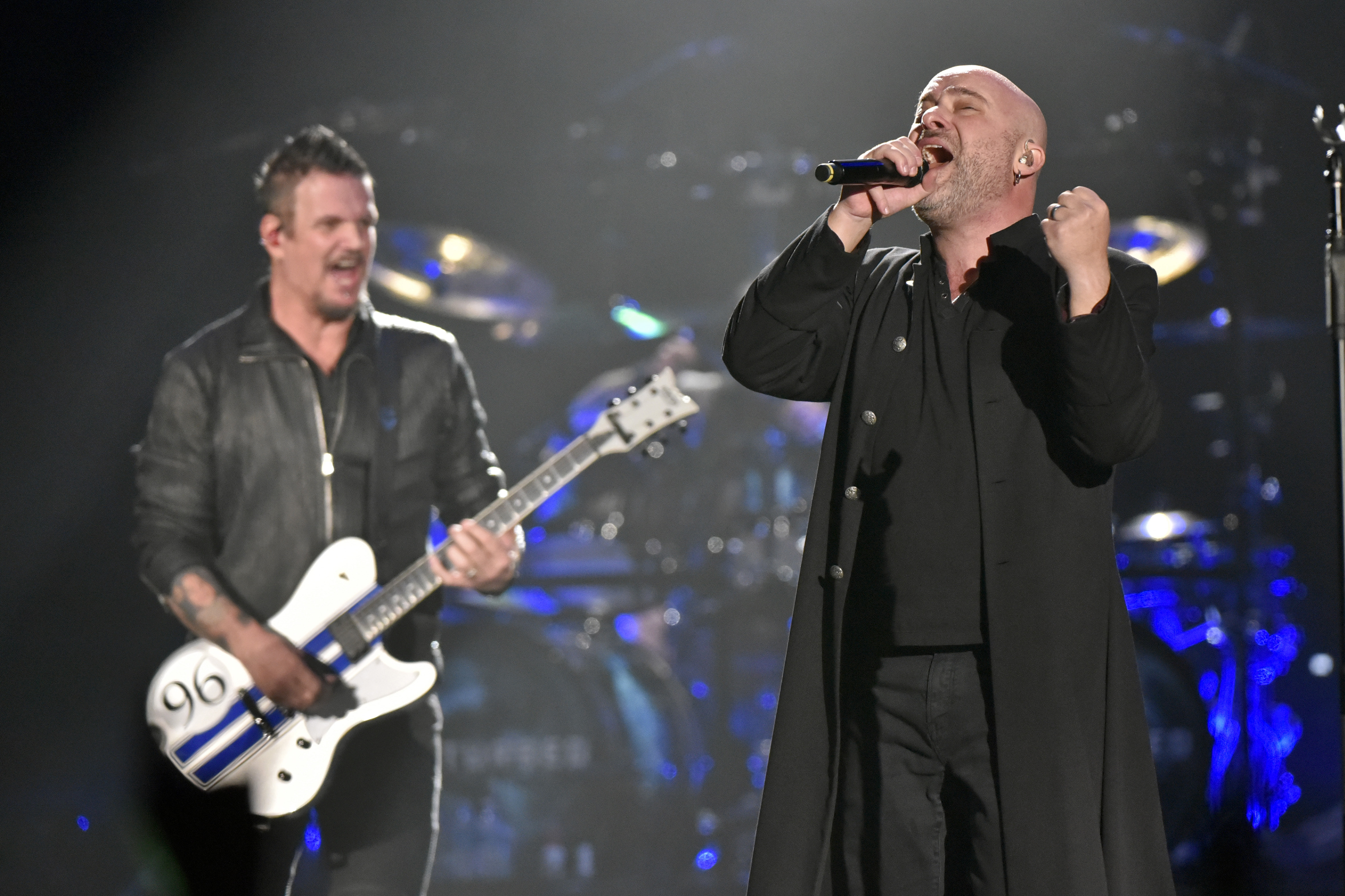 Taylor Swift receives praise from Disturbed lead singer: She still kicks  a**es