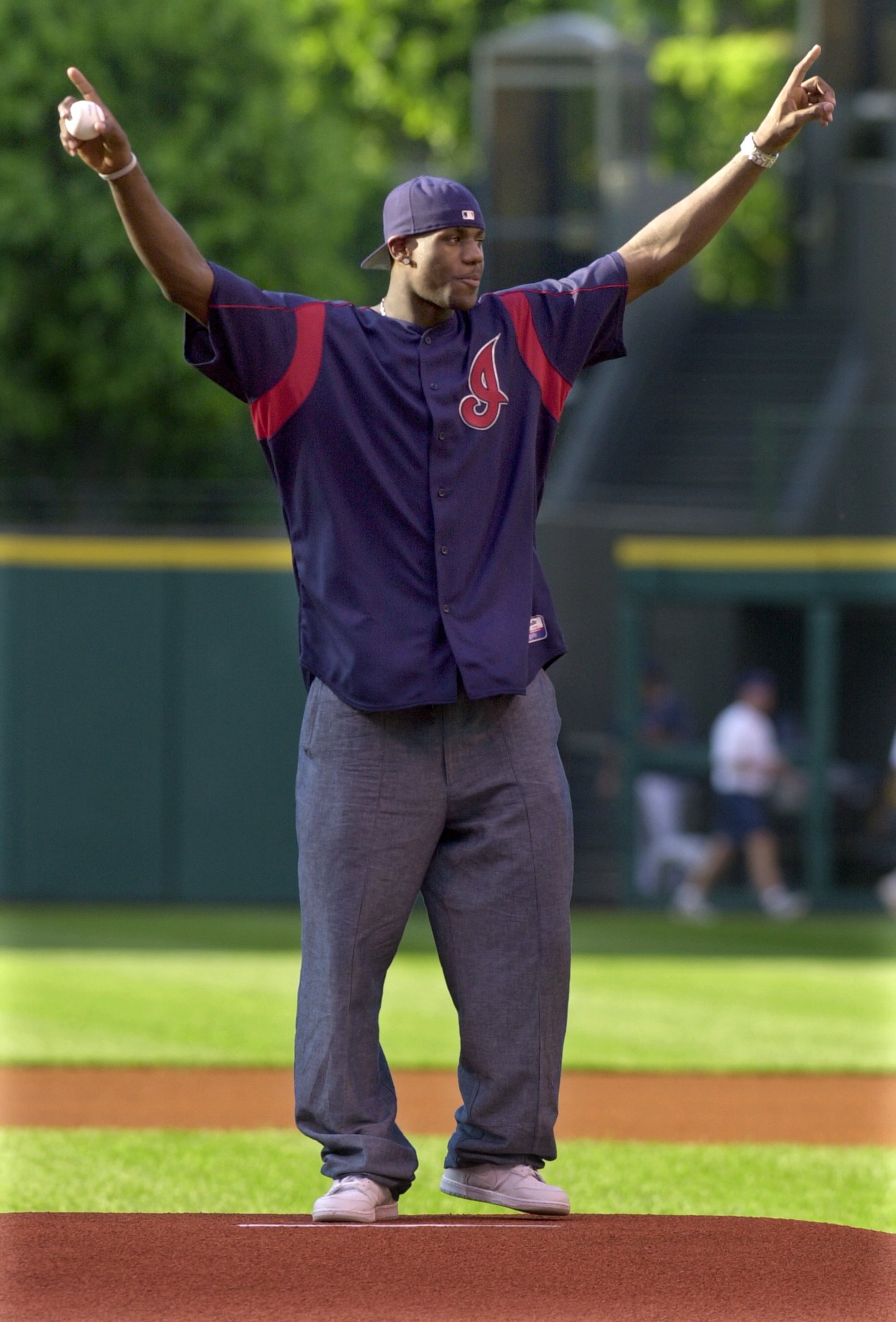 Cleveland Indians had the Cavaliers #1 draft pick LeBron James throw out the first pitch before last nights game against the Cincinnati Reds.  LeBron acknowledges the cheers from the fans before he threw the pitch.  Shot on June 27, 2003.  (Chuck Crow/The Plain Dealer)