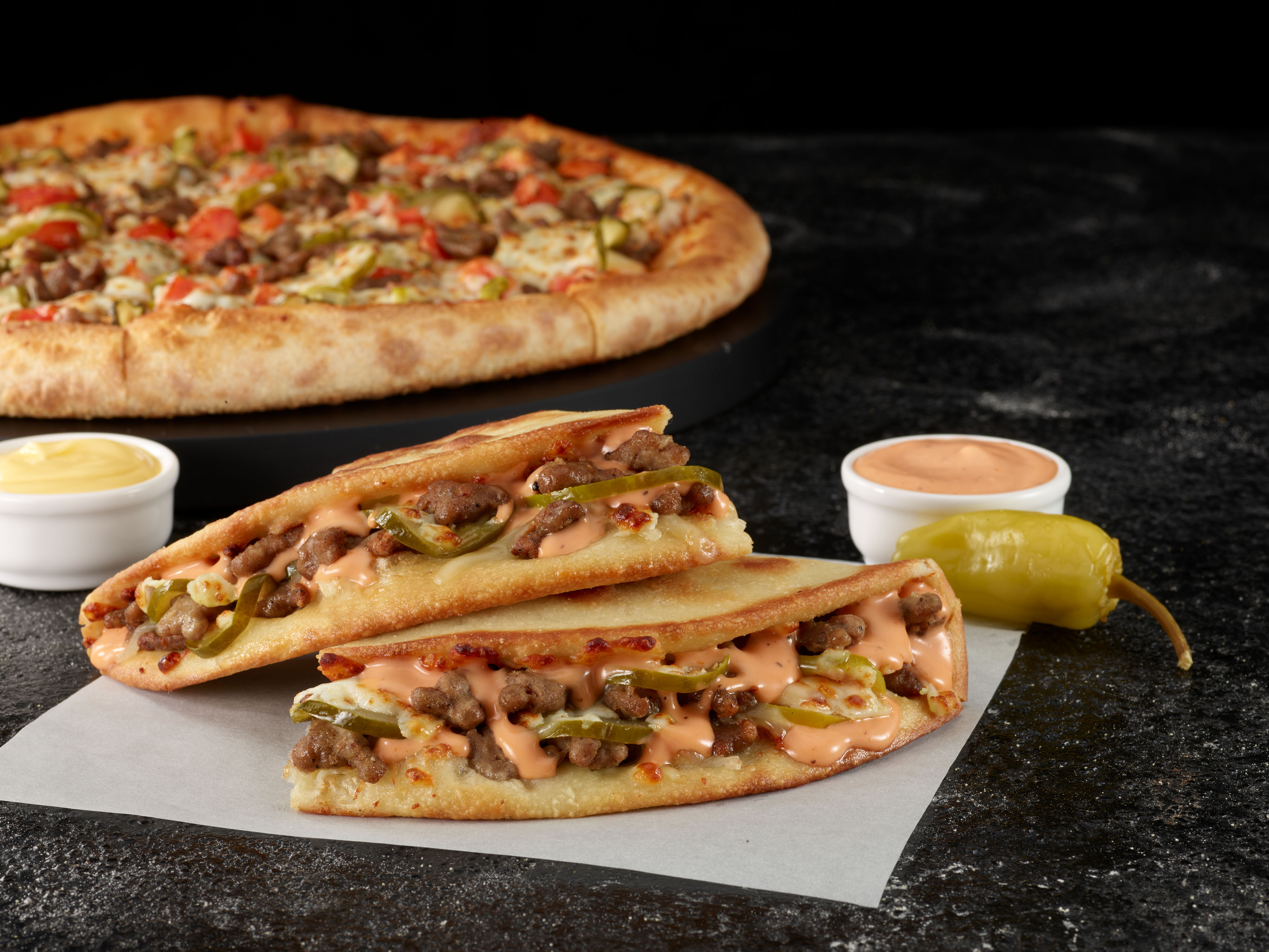 Papa John’s says yes to pickles and brings back Double Cheeseburger