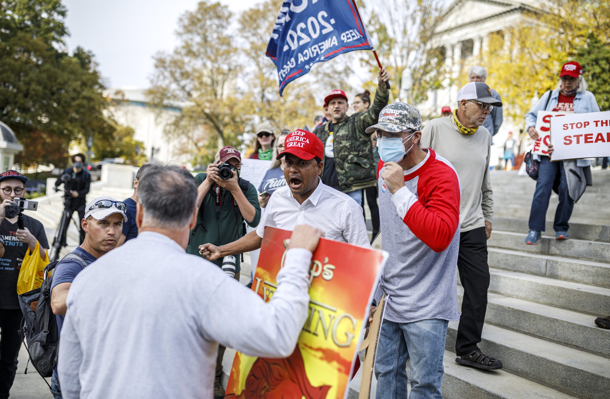 An argument erupts between rally attendees and Brent Stine of Harrisburg. A rally to "Stop the Steal" and to count every legal vote of the election is held at the Pennsylvania state Capitol in Harrisburg, November 5, 2020.
Dan Gleiter | dgleiter@pennlive.com