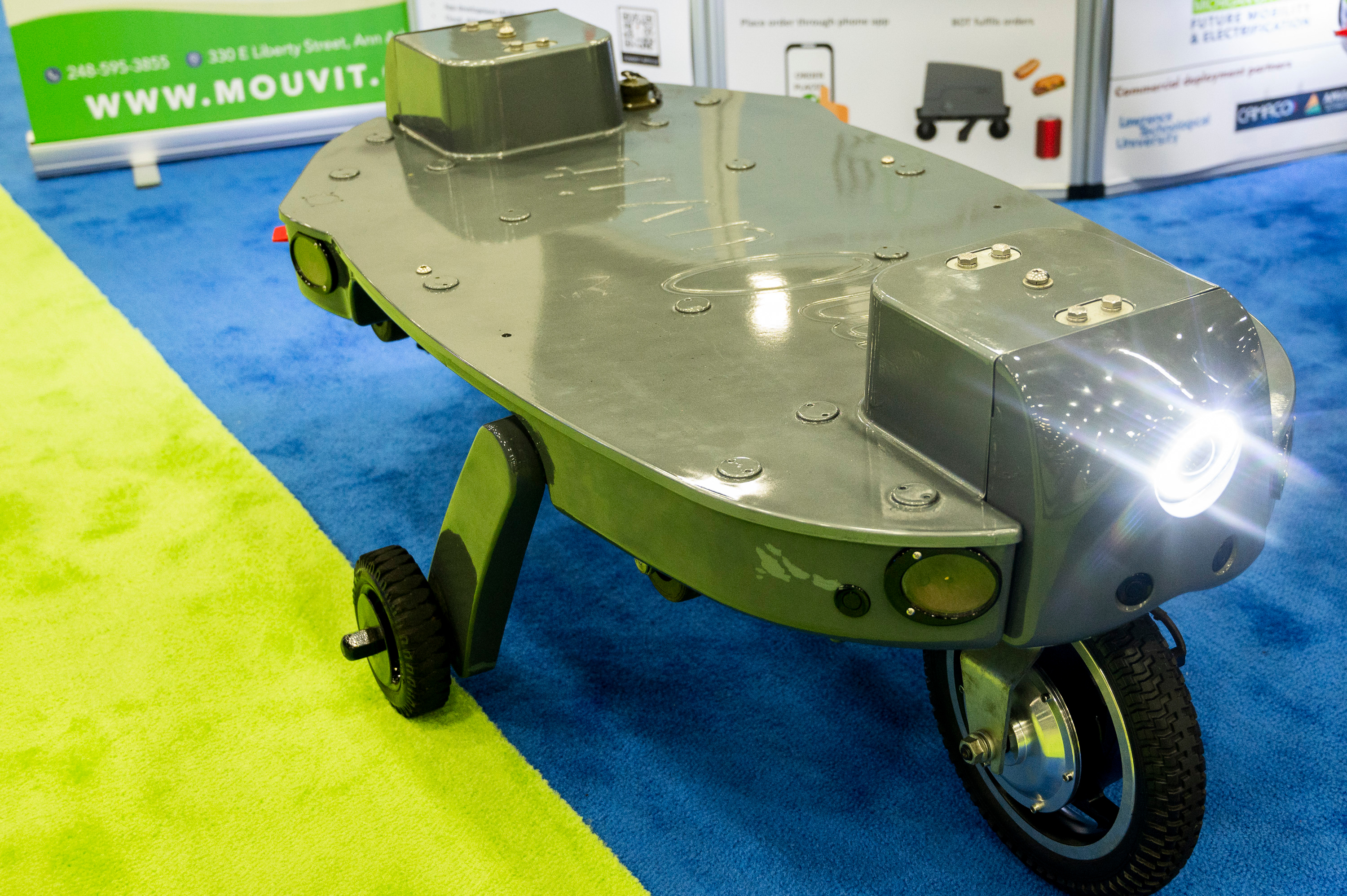 Mouvit autonomous food delivery vehicles on display during the 2022 North American International Auto Show at Huntington Place in Detroit on Wednesday, Sept. 14 2022.