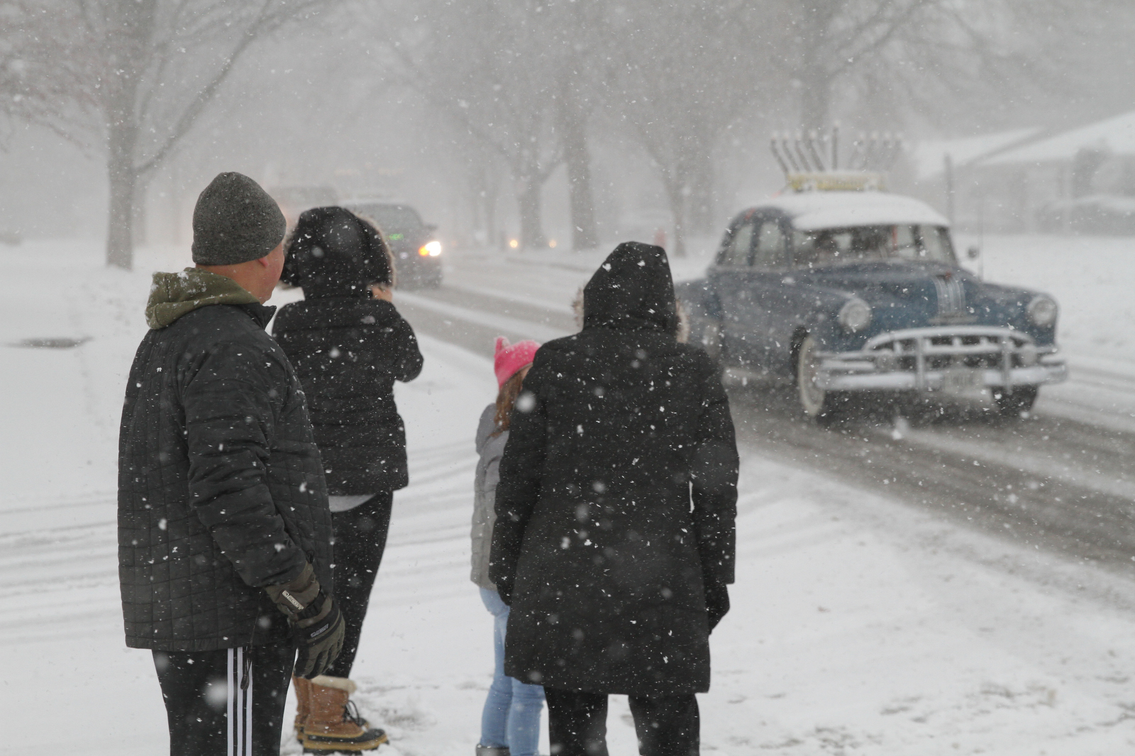 Menorah-topped cars parade through Cleveland eastern suburbs