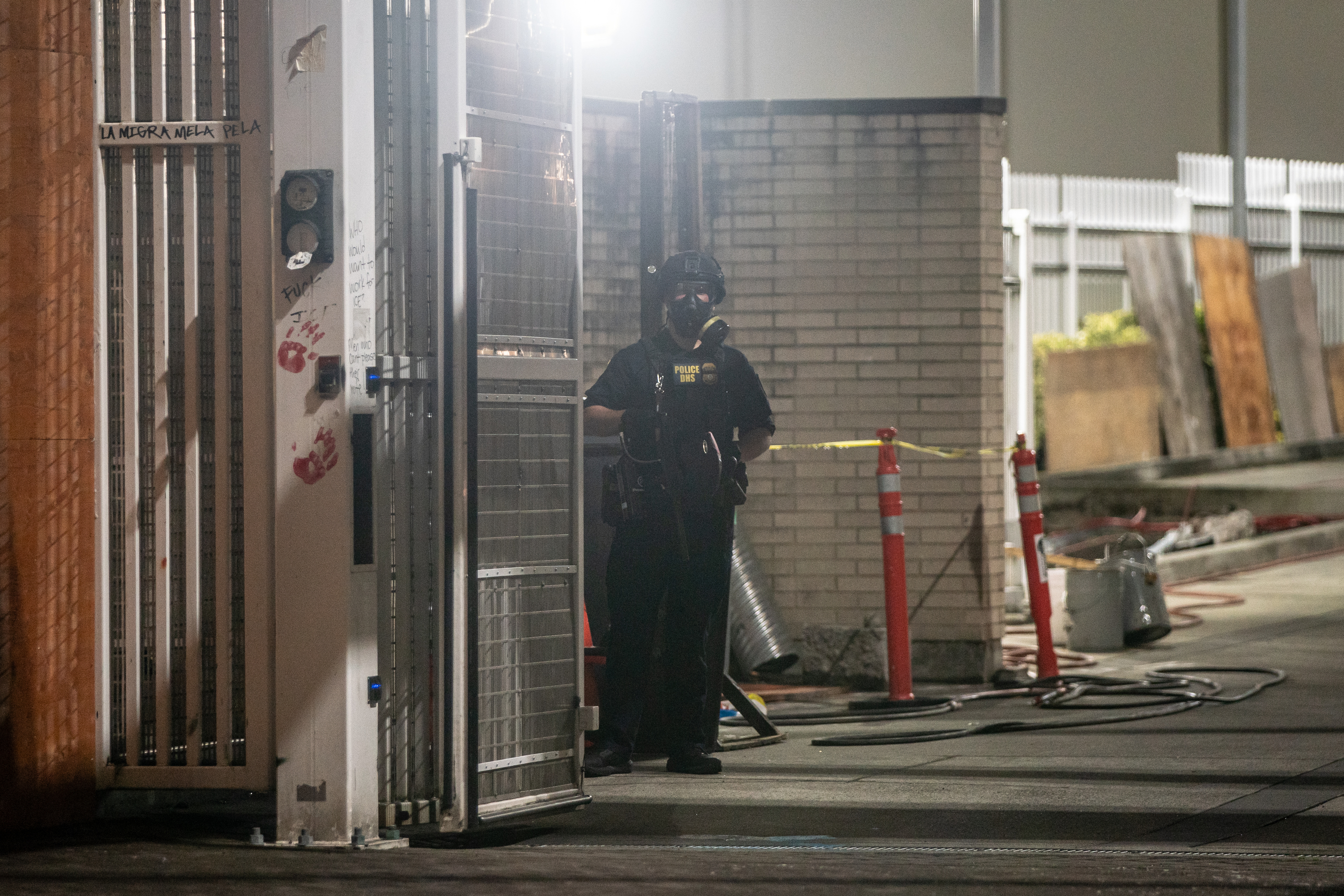 Protesters gather outside the boarded-up U.S. Immigration and Customs Enforcement building in South Portland on Monday, Sept. 8, 2025, days after President Donald Trump suggested federal intervention.