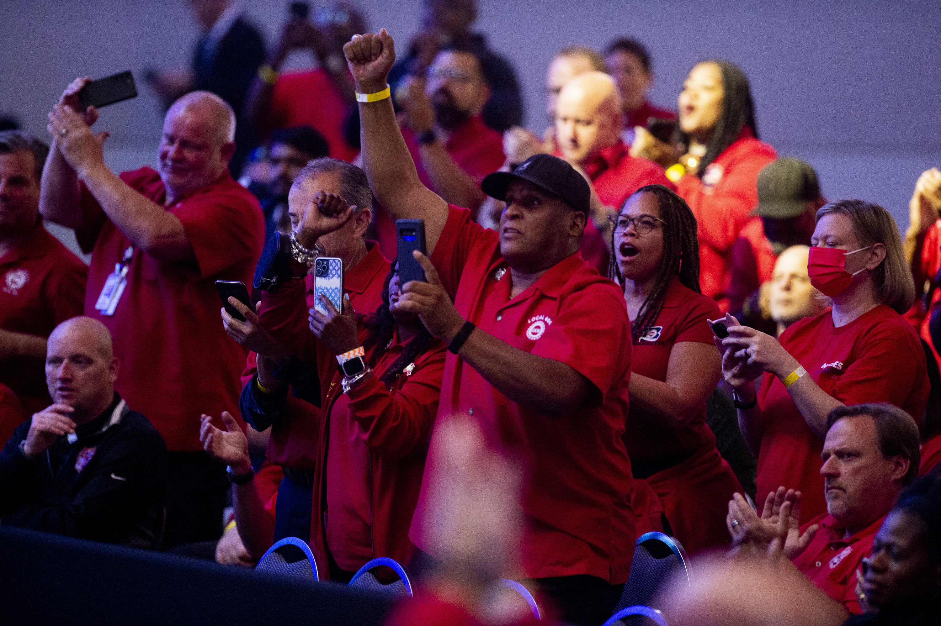 UAW members cheer as U.S. President Joe Biden speaks during the 2022 North American International Auto Show at Huntington Place in Detroit on Wednesday, Sept. 14 2022.