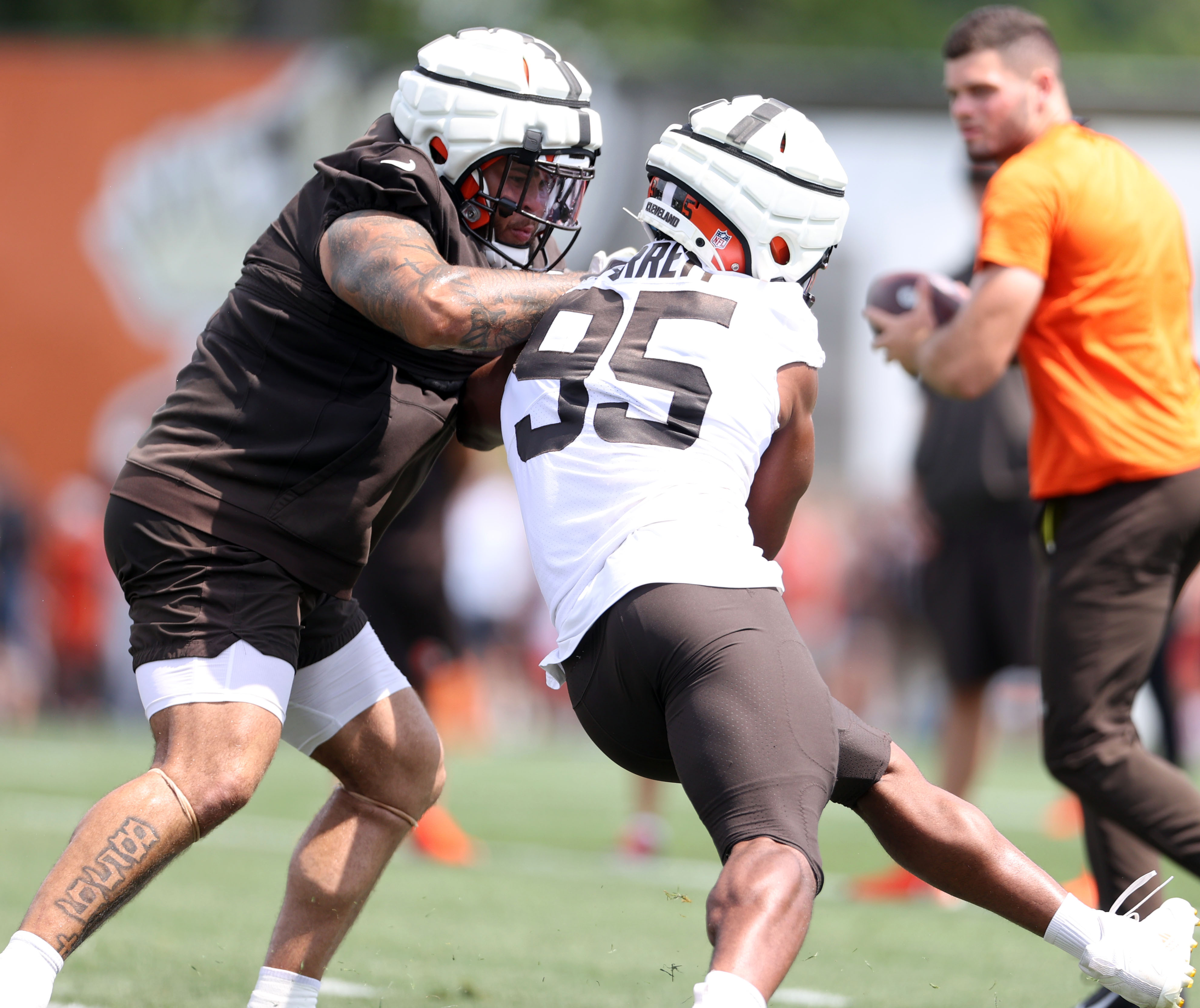 Jedrick Wills Jr. #71 of the Cleveland Browns walks to the bench