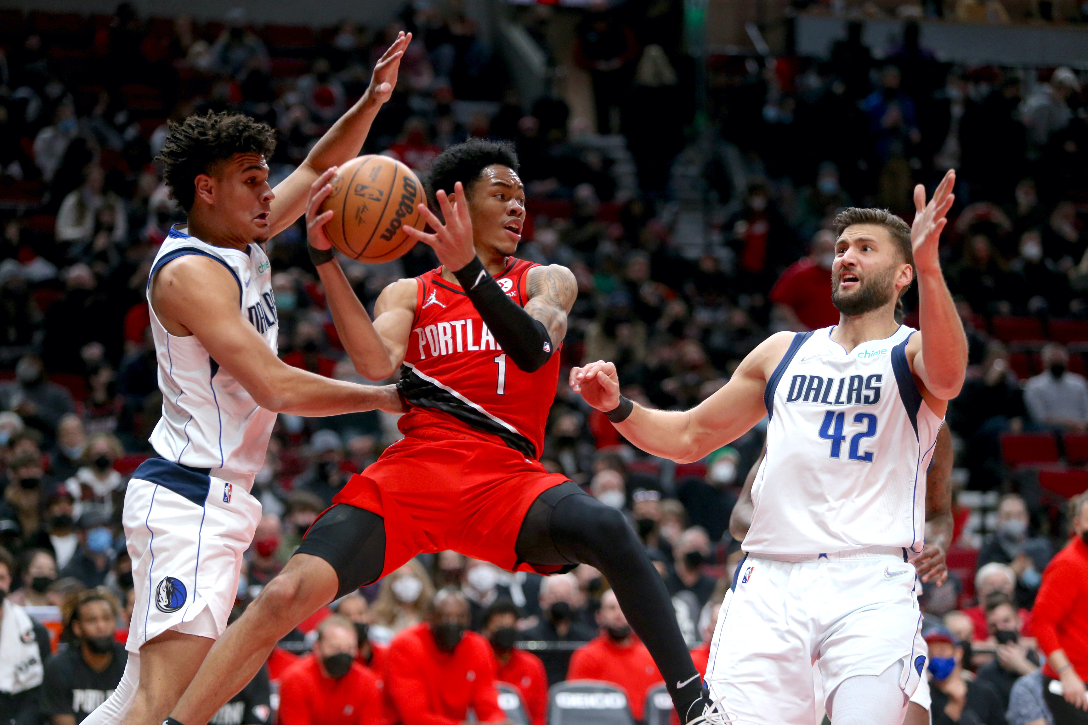 Doncic's triple-double helps Dallas down Portland 132-112 - The