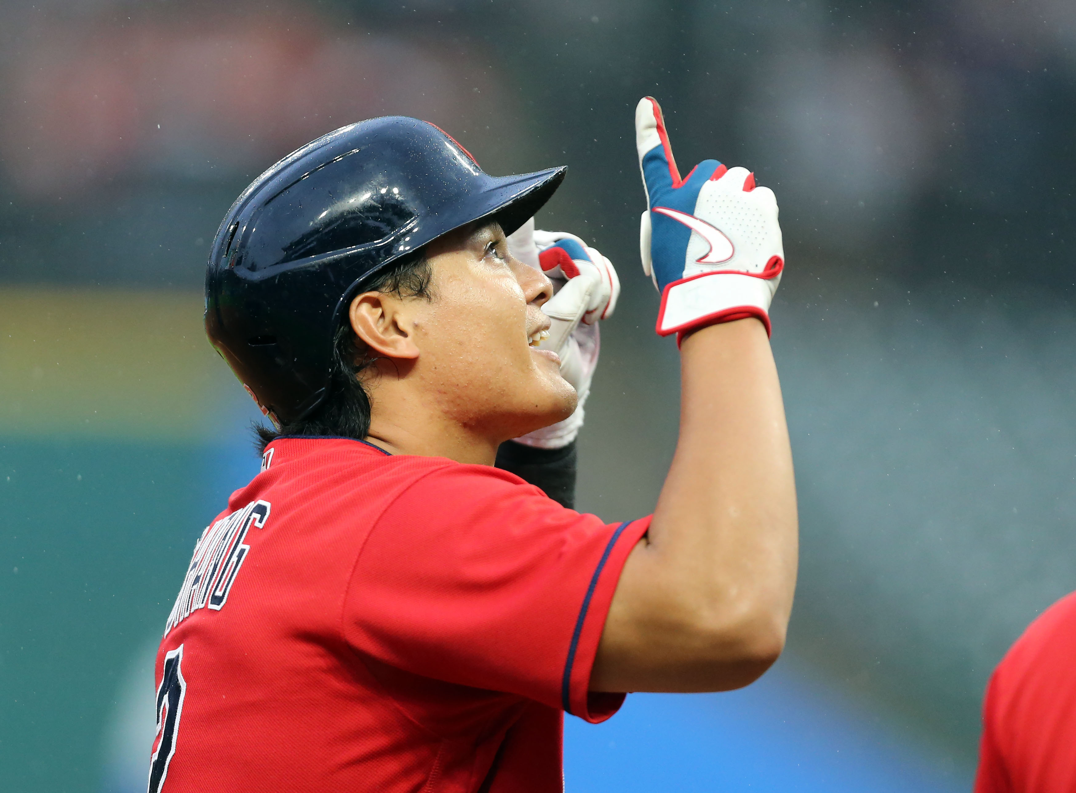 Kansas City Royals' Carlos Santana celebrates hitting an RBI