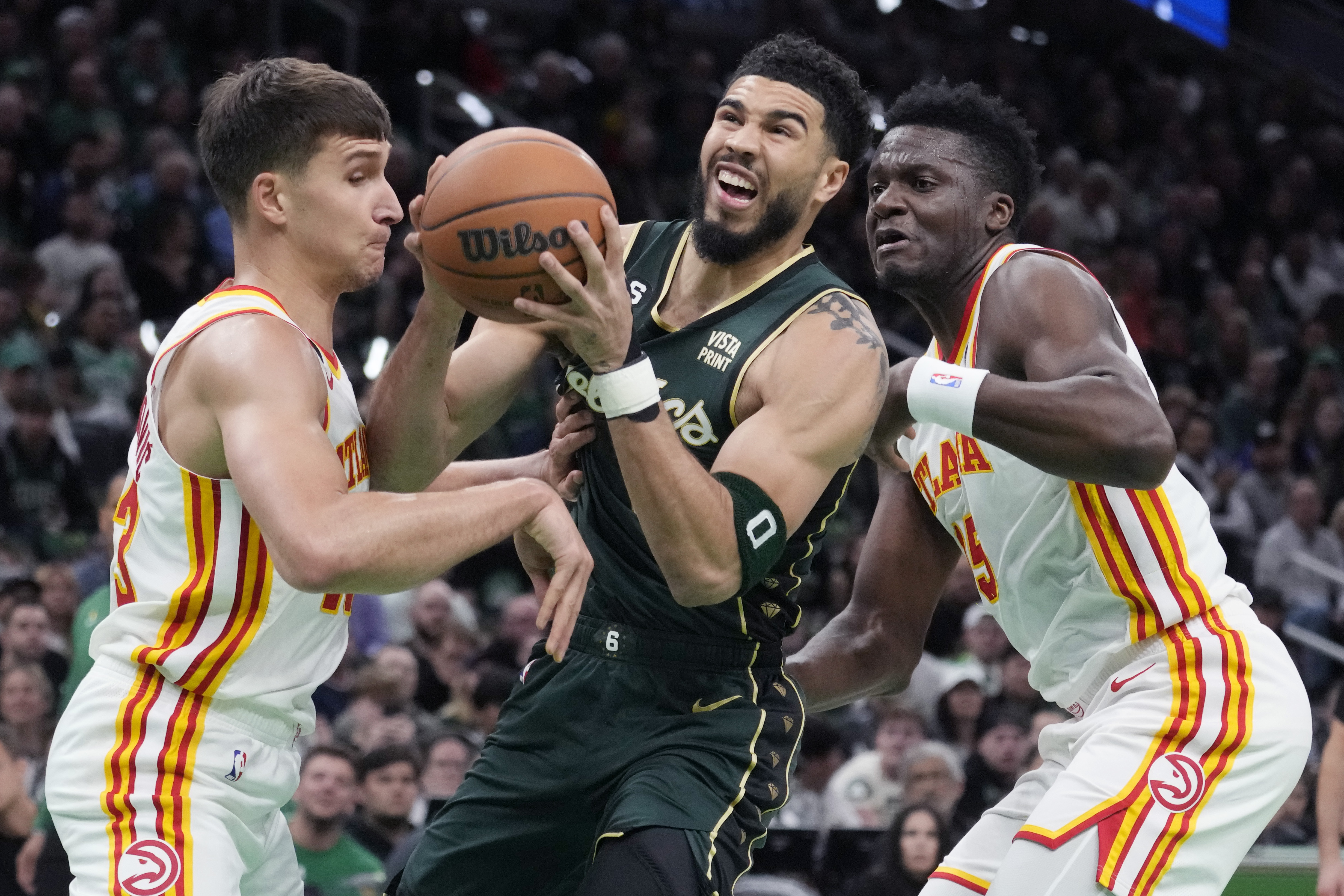 Atlanta Hawks guard Bogdan Bogdanovic (13) shoots the ball against the  Boston Celtics the fourth quarter of game one of the 2023 NBA playoffs at  TD Garden.