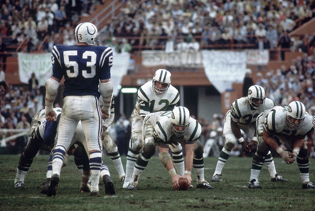 New York Jets hall of fame quarterback Joe Namath and Don Maynard (13)  stand on the field during a ceremony honoring the Super bowl III Jets at  halftime of the New York