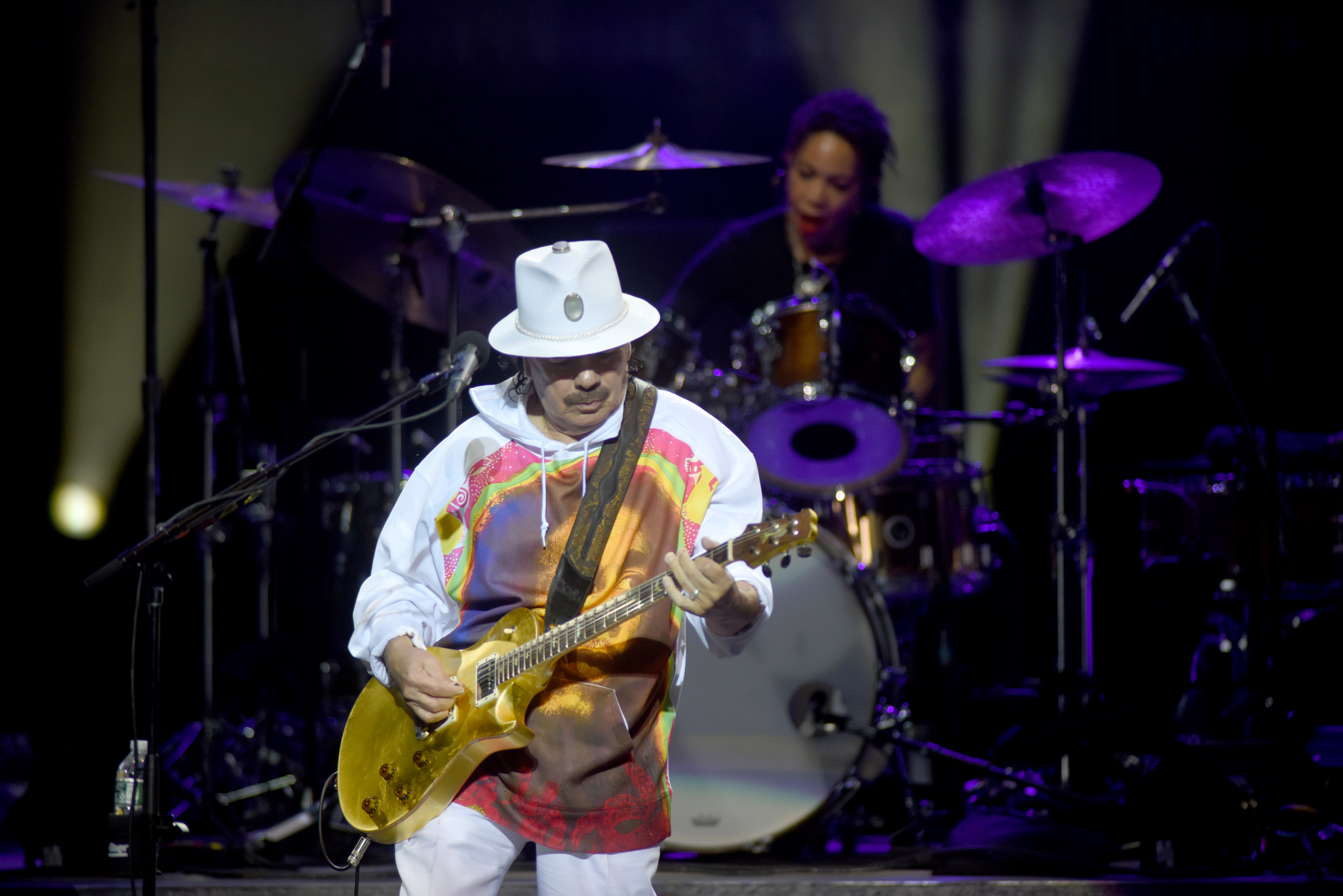 Carlos Santana apologizes for anti-trans comments: 'A woman is a