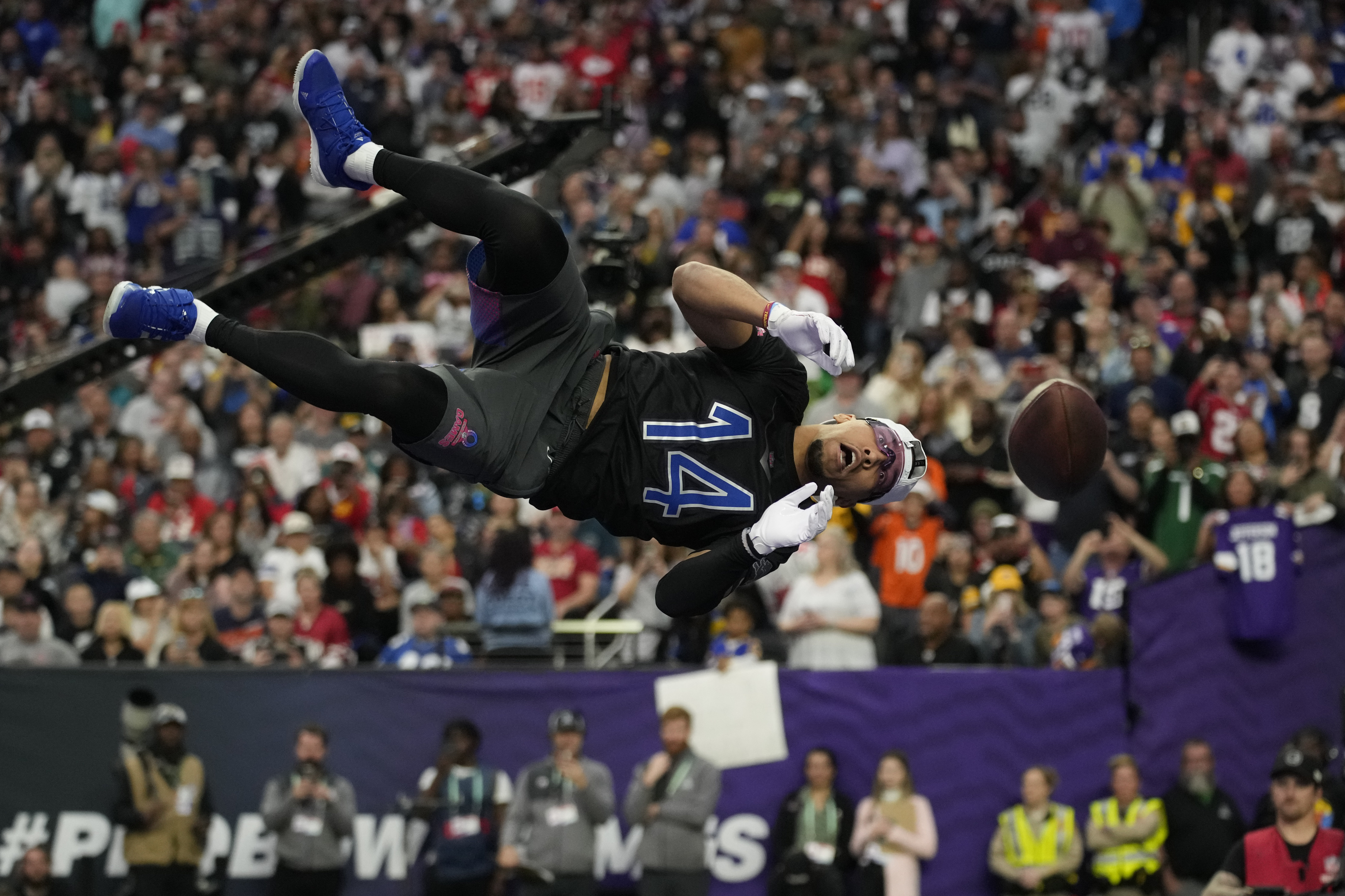 NFC tight end George Kittle (85) of the San Francisco 49ers celebrates a  touchdown with NFC wide receiver Justin Jefferson of the Minnesota Vikings  during the flag football event at the NFL