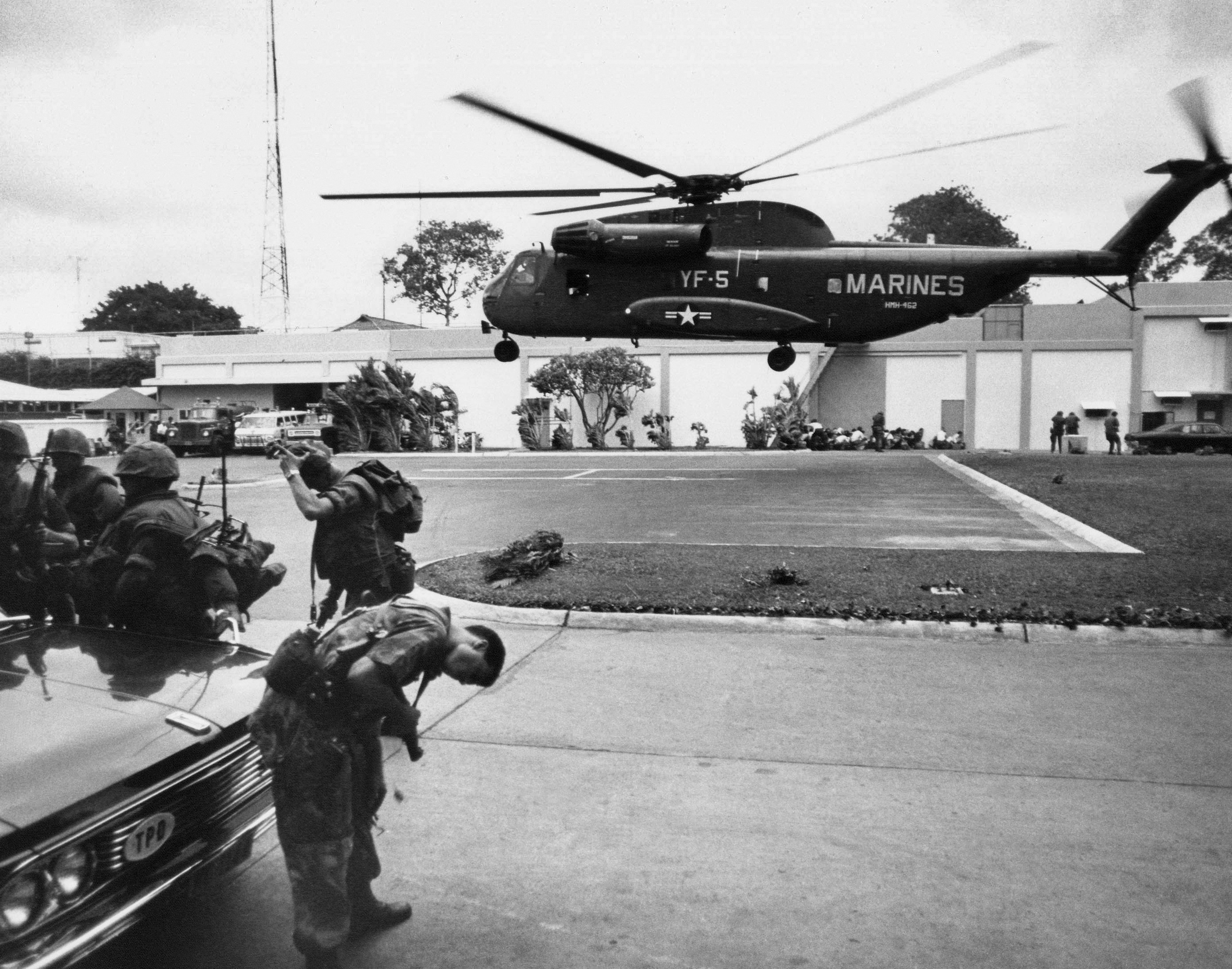In this April 29, 1975, file photo, a helicopter lifts off from the U.S. embassy in Saigon, Vietnam, during the evacuation of authorized personnel and civilians. (AP Photo/File)