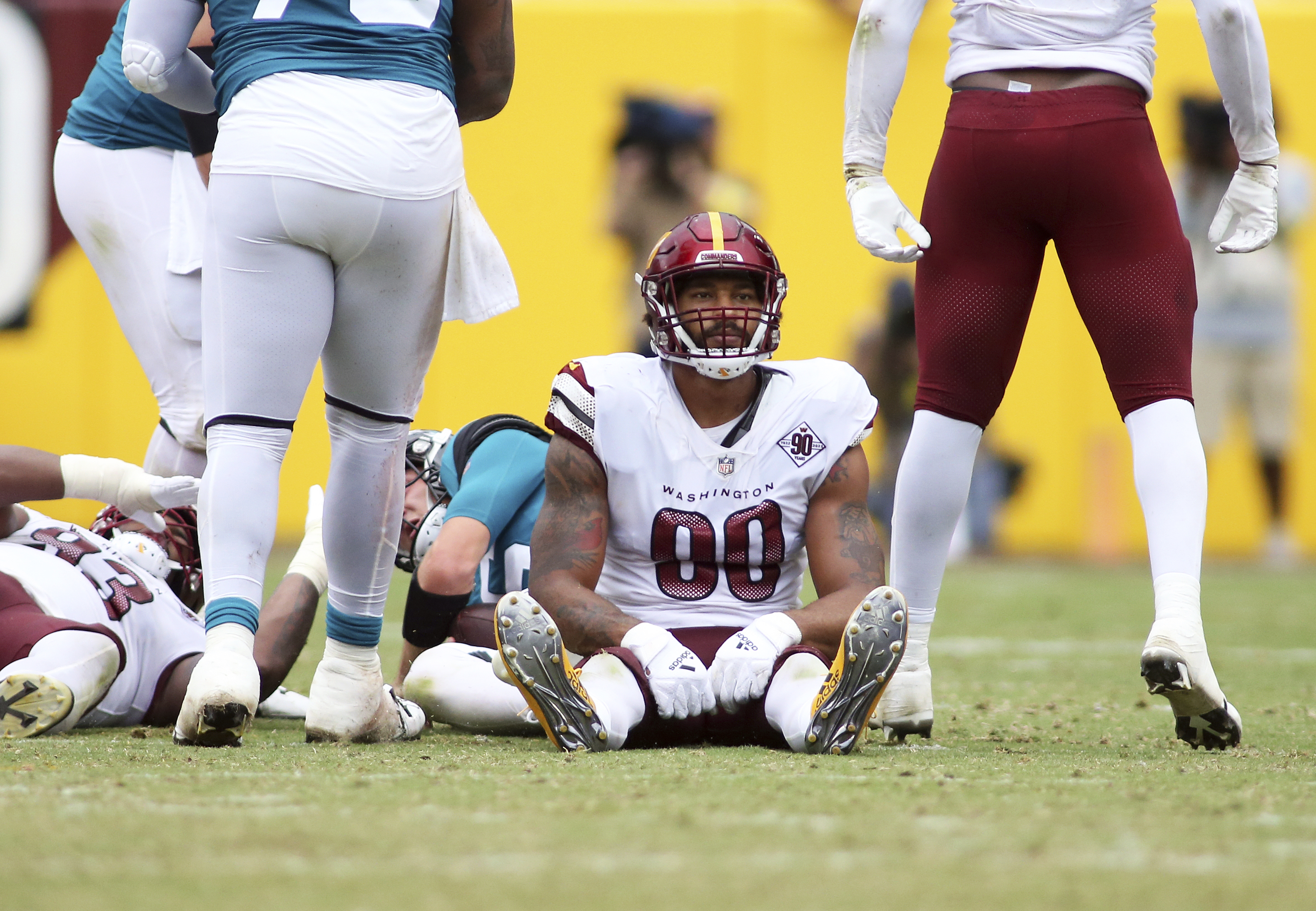 Washington Commanders defensive end Montez Sweat (90) runs during