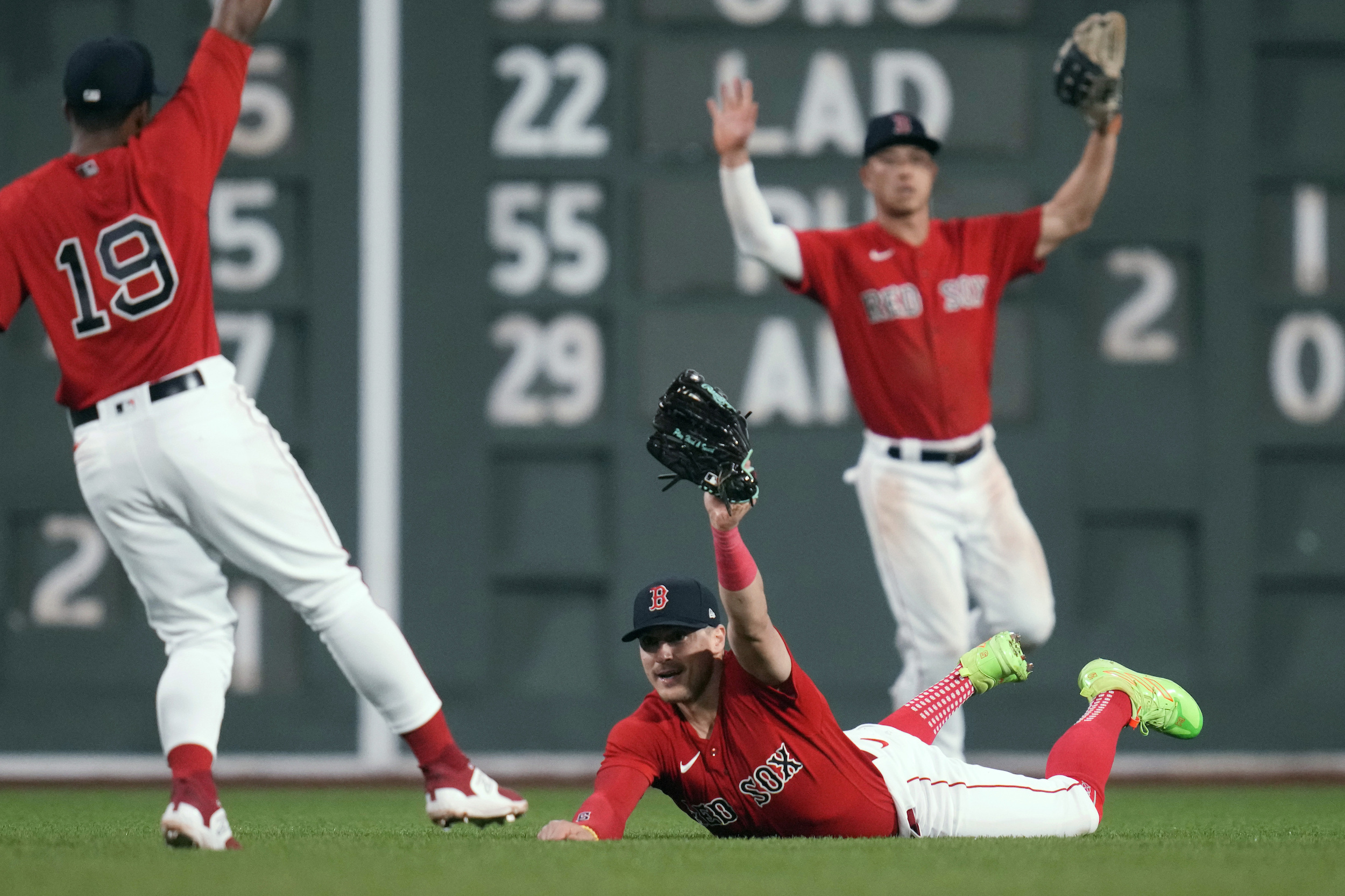 Rockies beat Red Sox, 4-3, in their first extra-inning game of season