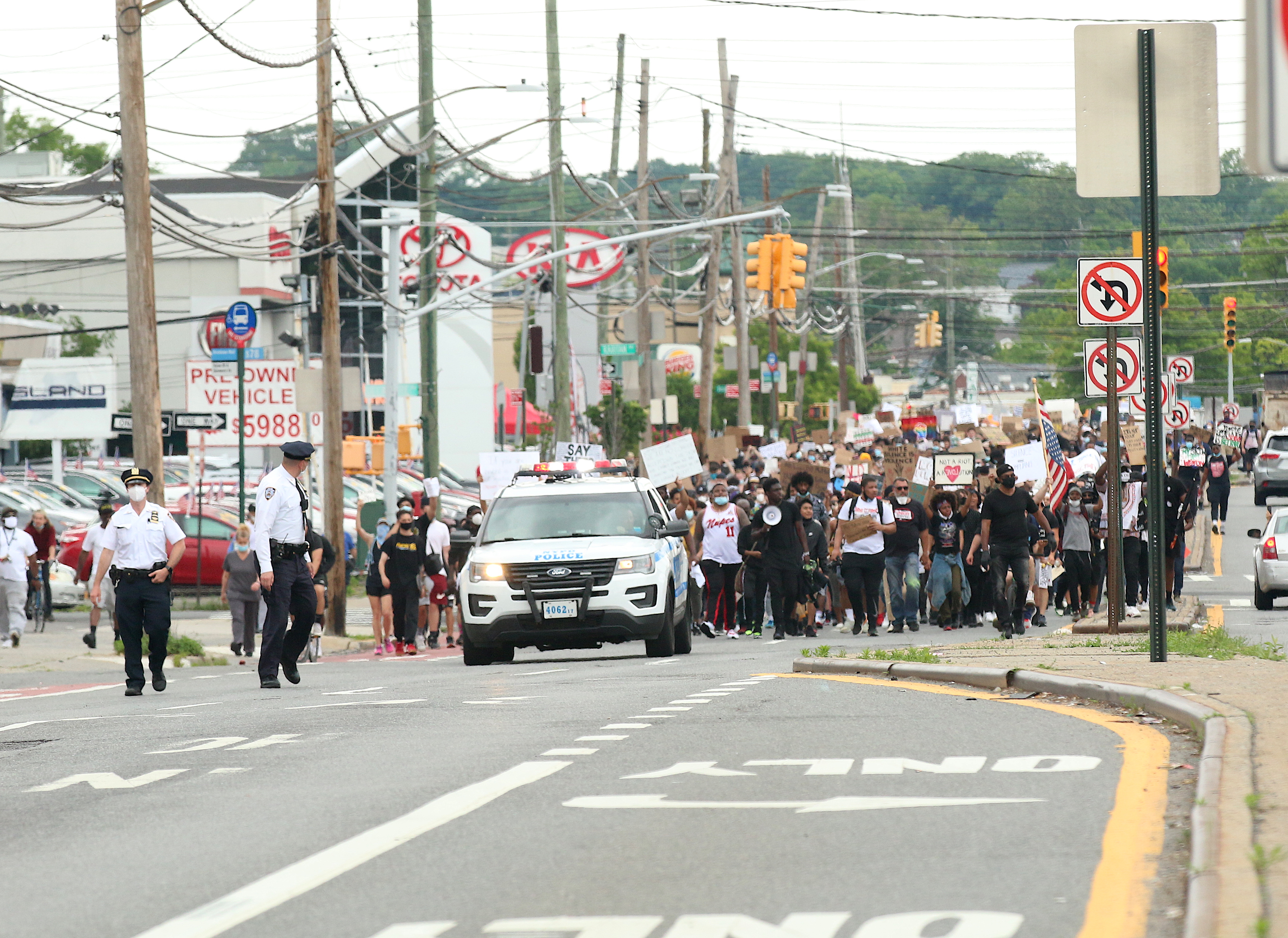 Peaceful marching continues along Hylan Boulevard southbound to the 122 precinct.  (Staten Island Advance/Jan Somma-Hammel)