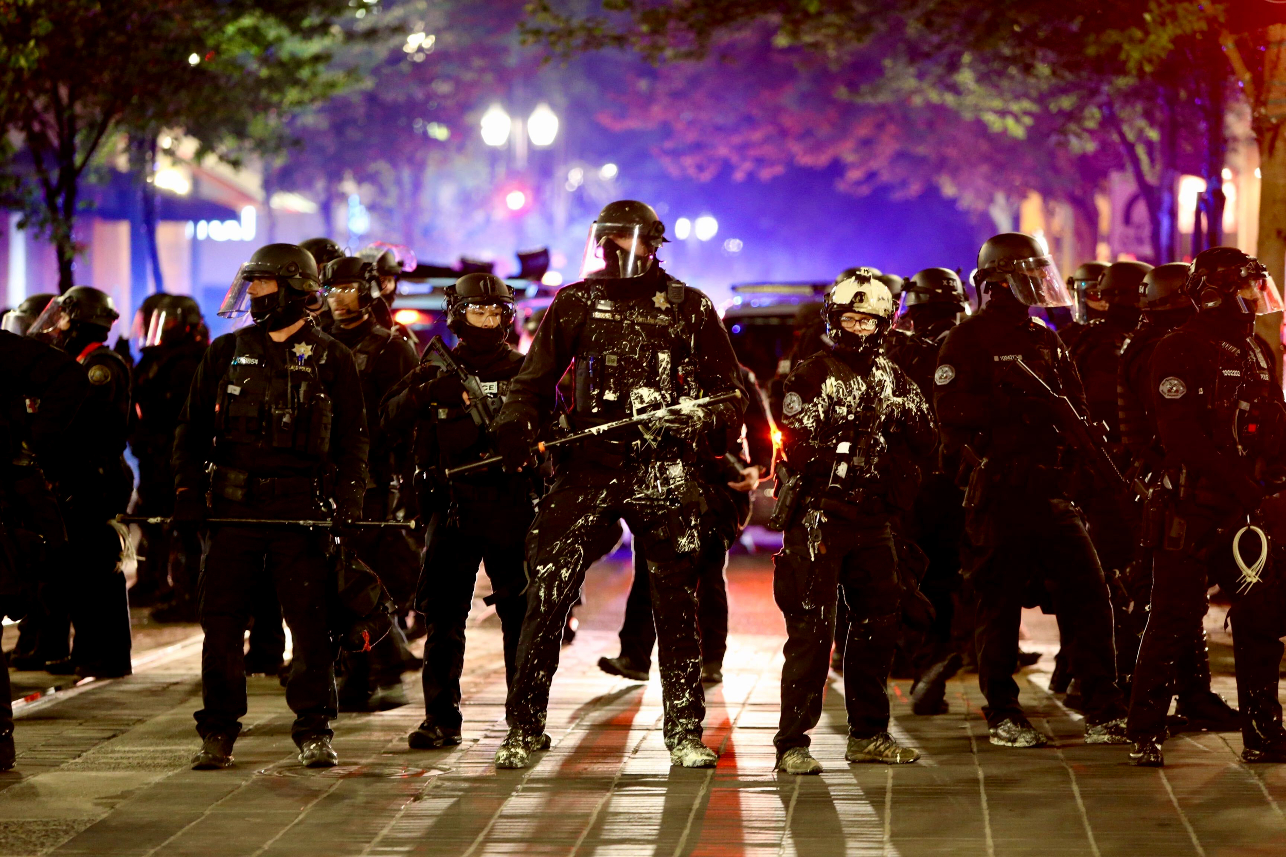 The Portland Police declared the gathering in downtown Portland on Aug. 13, 2020 a riot and pushed the protesters away from the Justice Center.
