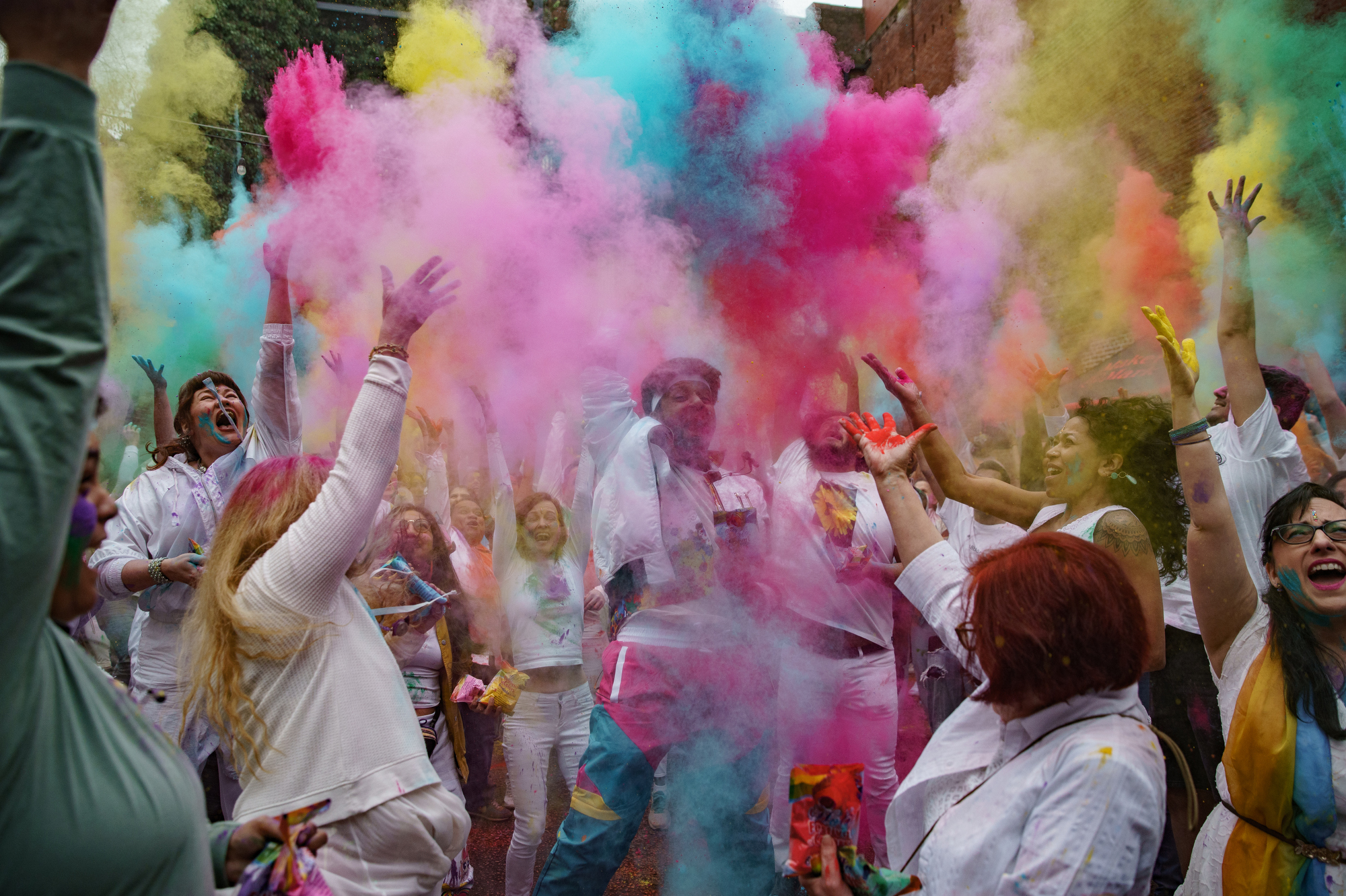 Colored powder flies as Hindus celebrate Holi