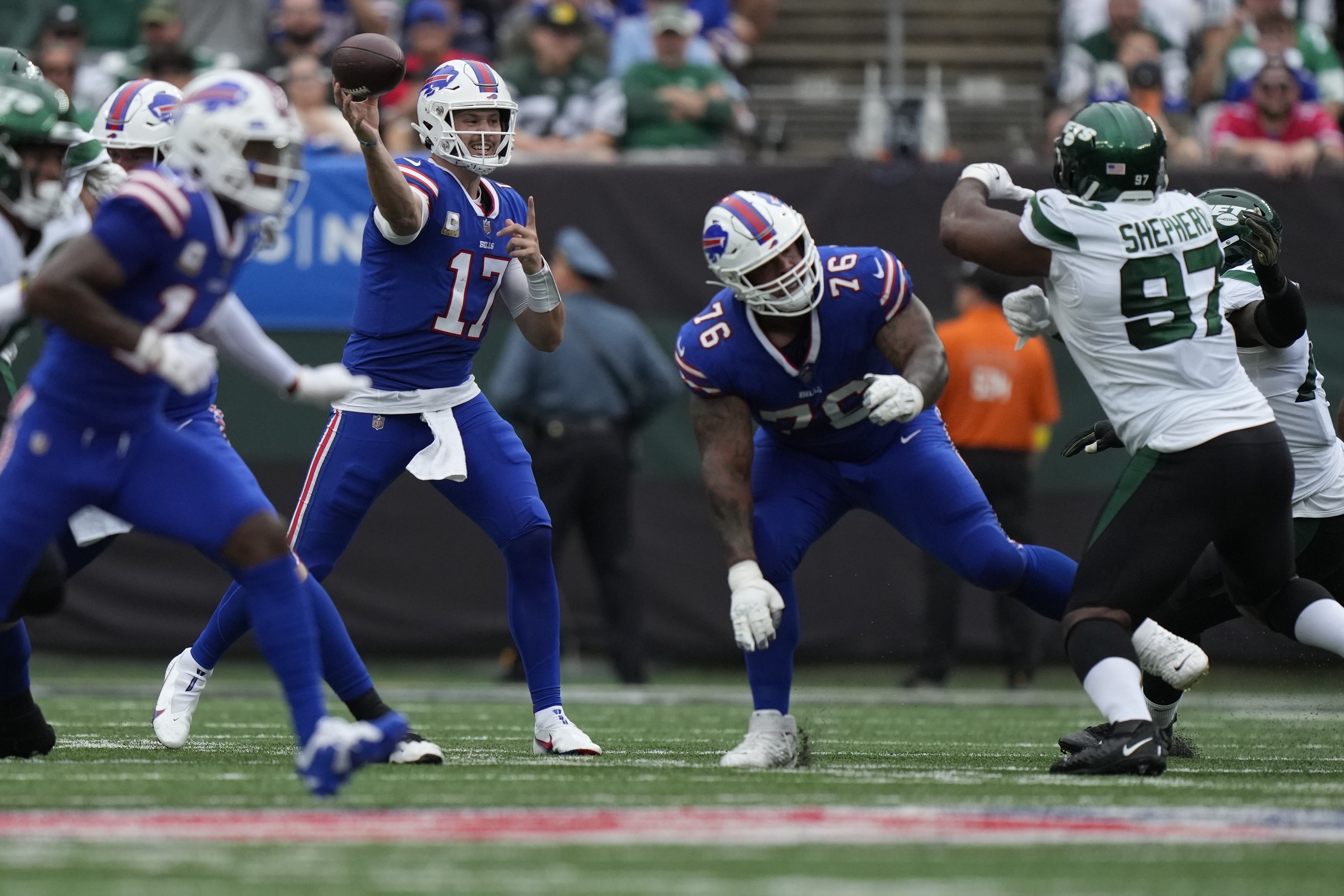 New York Jets' Jermaine Johnson (52) tackles Buffalo Bills quarterback Josh  Allen (17) during the second half of an NFL football game, Sunday, Nov. 6,  2022, in East Rutherford, N.J. The Jets