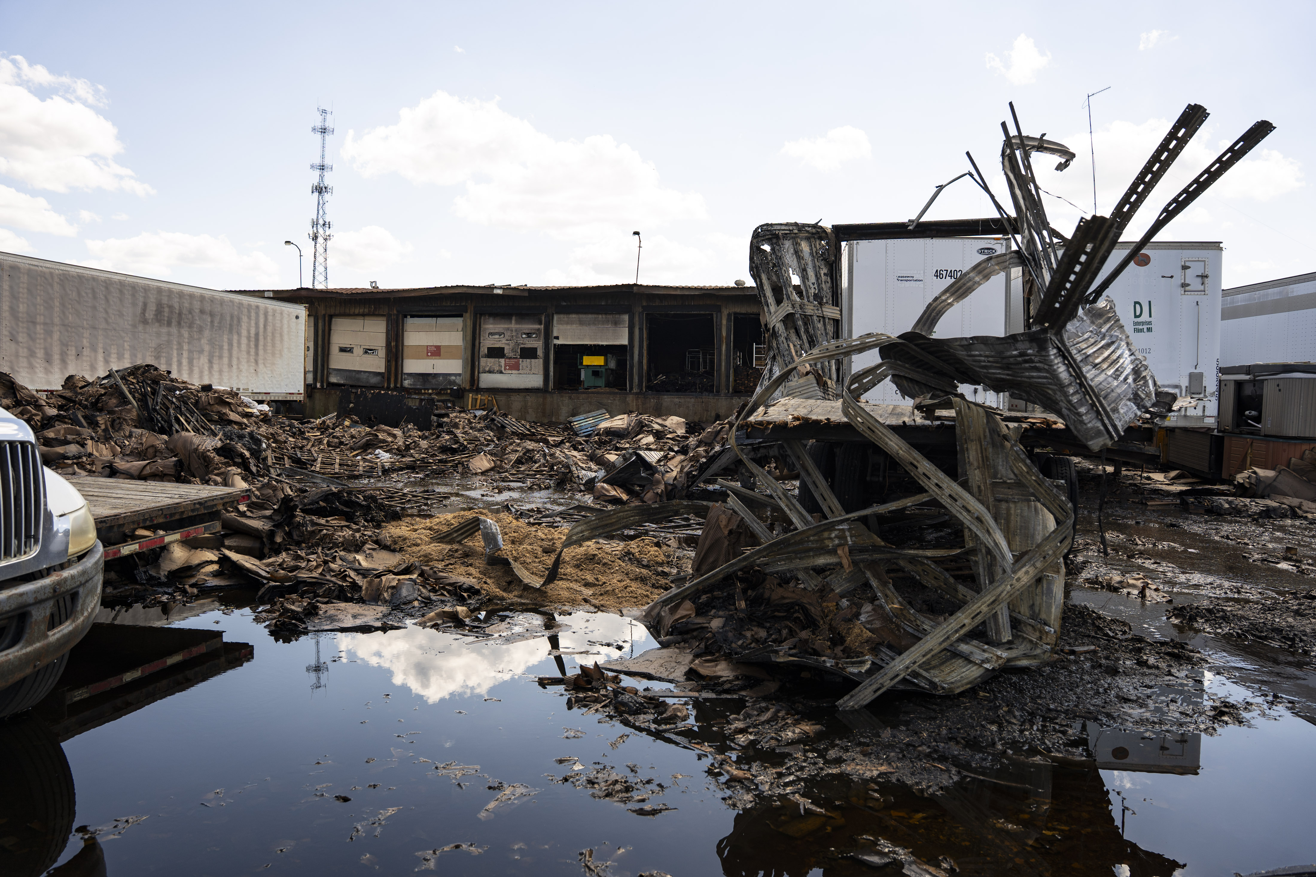 Dit Fire Firefighters work to extinguish a fire at D.I. Enterprises - mlive.com