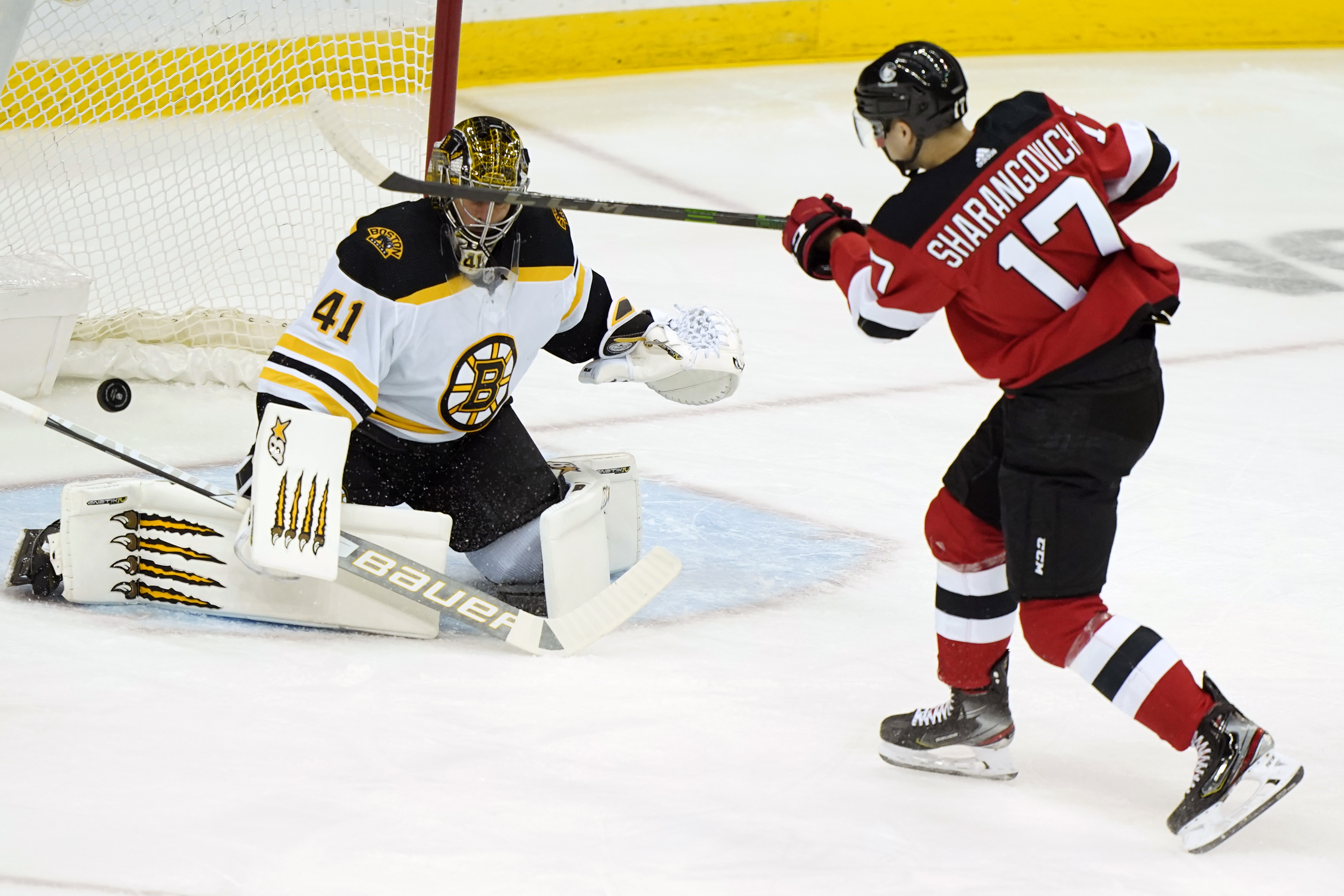 Marchand scores twice, Bruins end Devils 3-game win streak